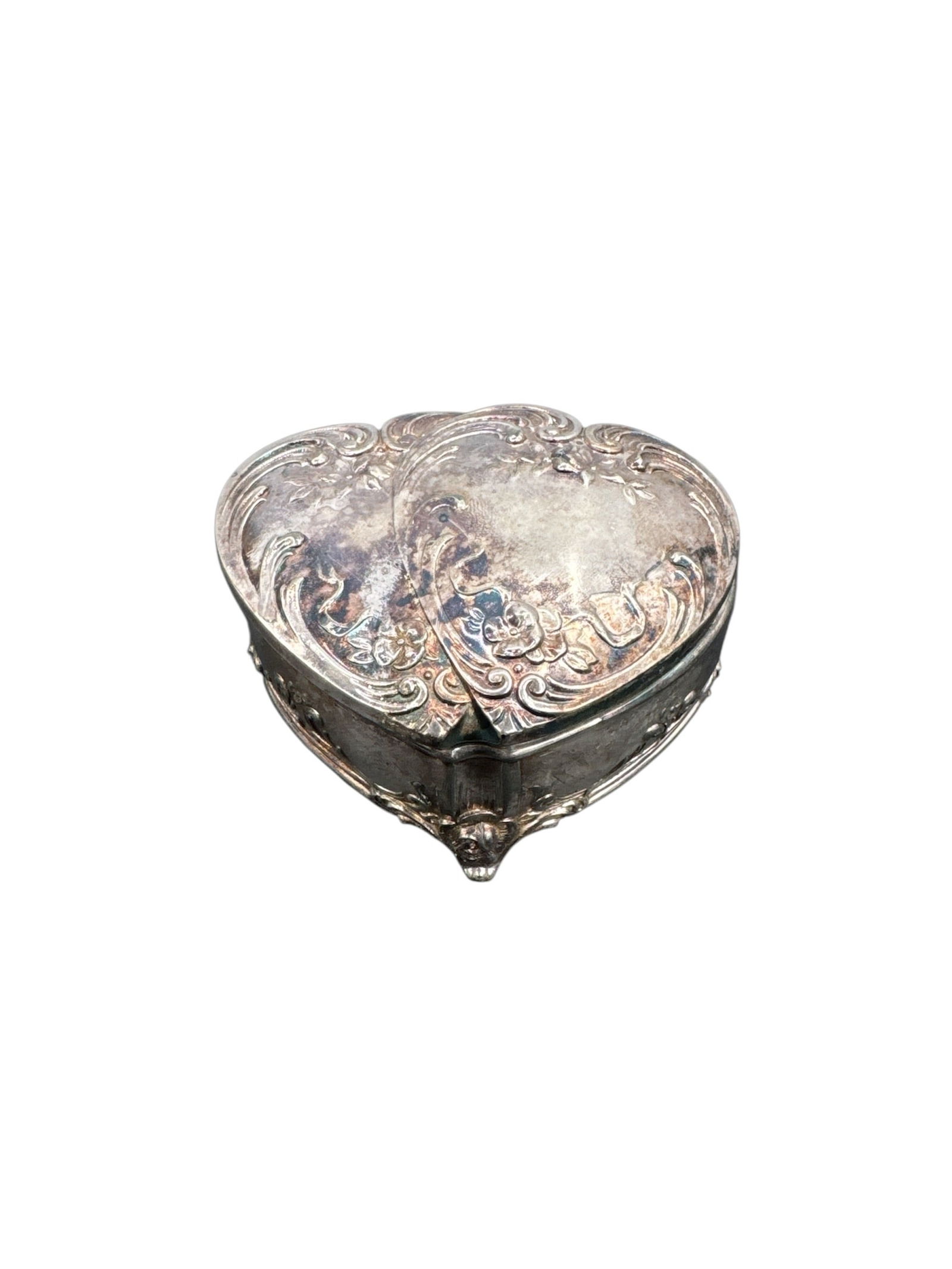 Silver Plated Heart-Shaped Box: A heart-shaped silver plated box with ornate detailing. Dimensions: 2x4x3 inches.