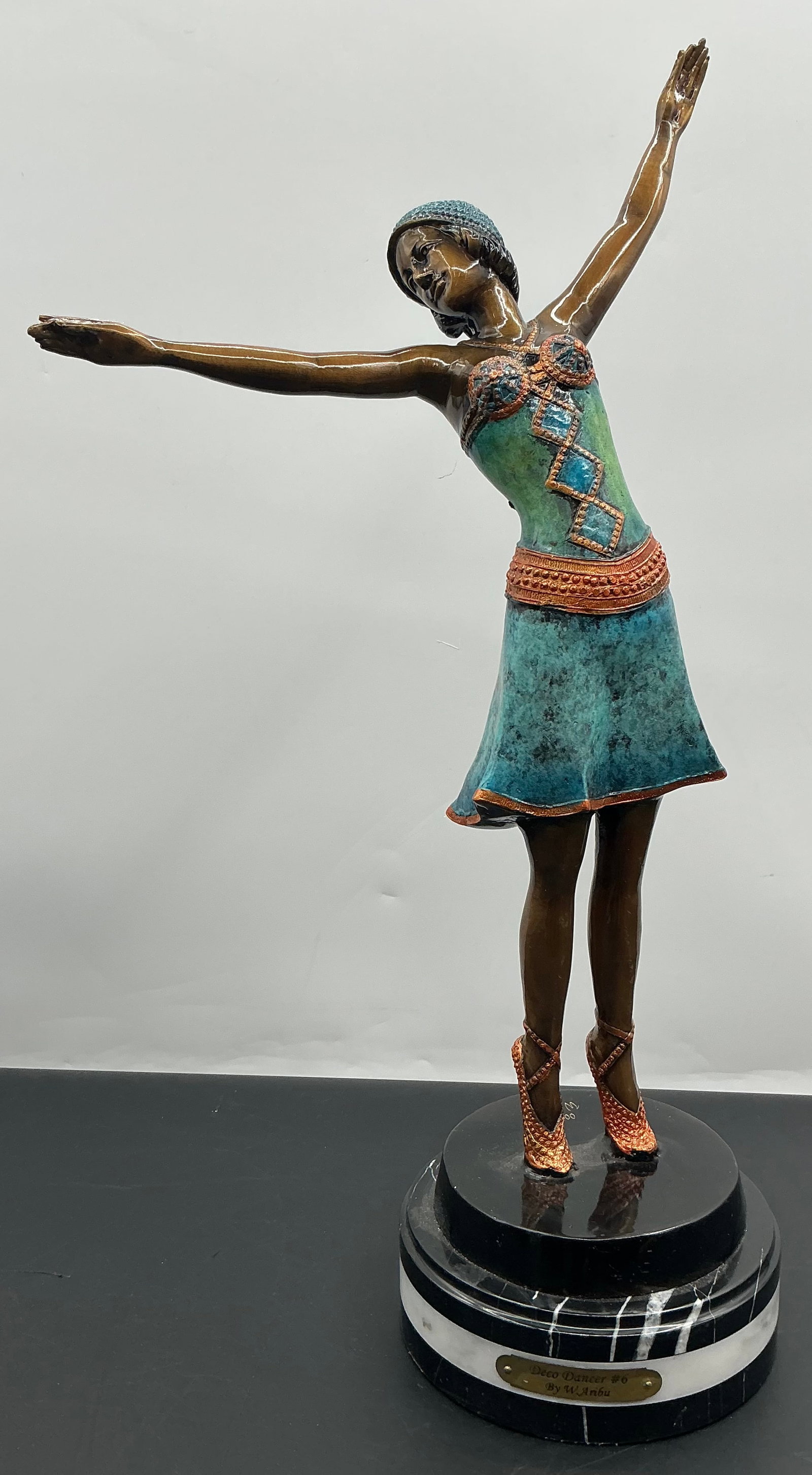 Bronze art deco dancer: Bronze Art deco dancer with a polychromatic patina on marble base.Dimensions:H25in L13in W8in