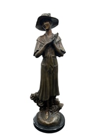 Bronze Sculpture of a Woman with Hat