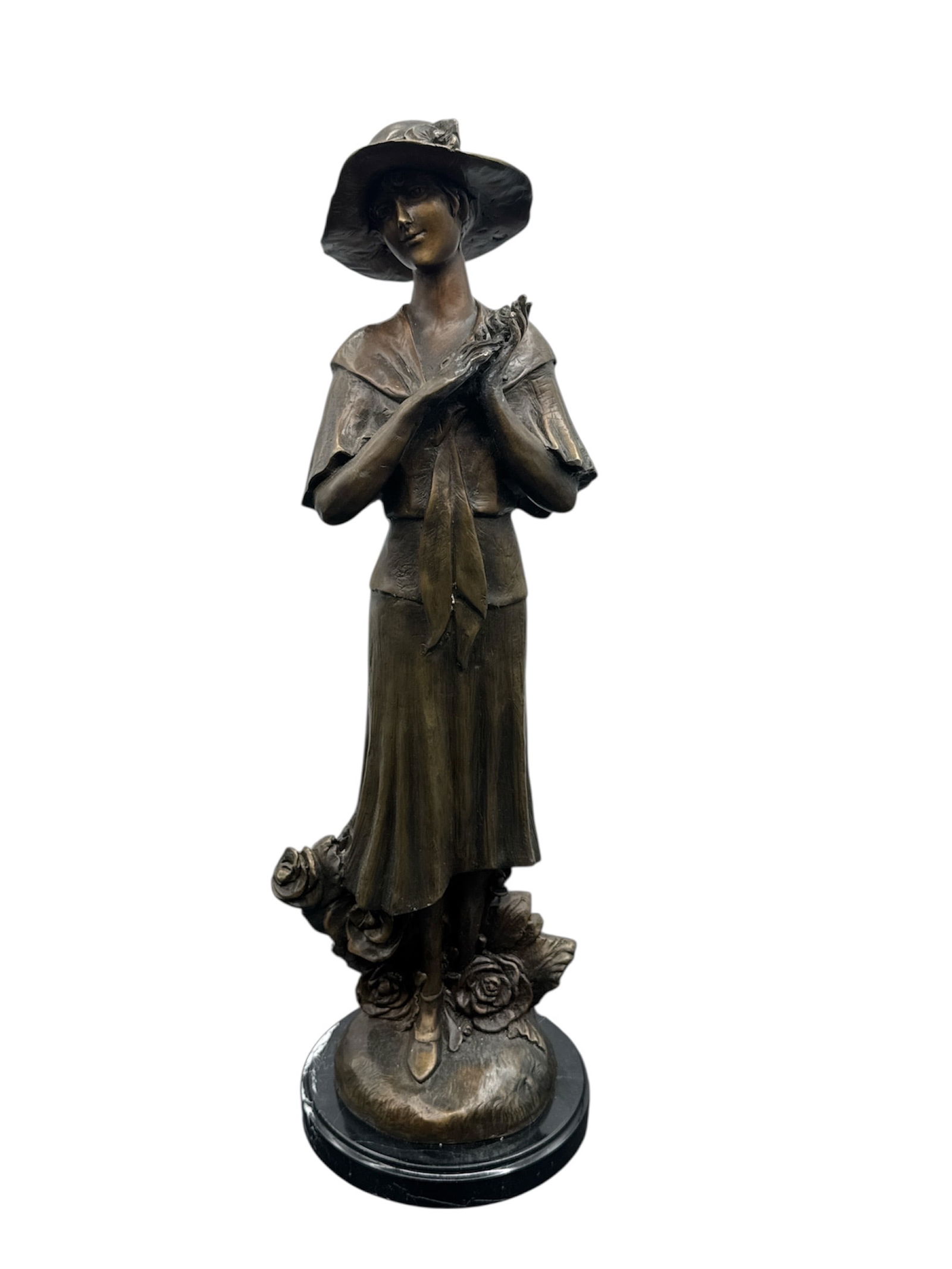 Bronze Sculpture of a Woman with Hat: Bronze sculpture of a woman in a dress and hat, signed G. Mancini. Mounted on a marble base. Dimensions: H:24in, L:7in, W:7in.