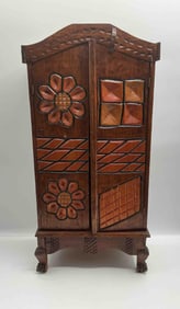 Hand-Carved Folk Art Wooden Cabinet with Floral and Geometric Motifs