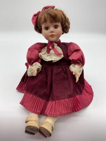 Vintage Porcelain Doll in Burgundy Dress