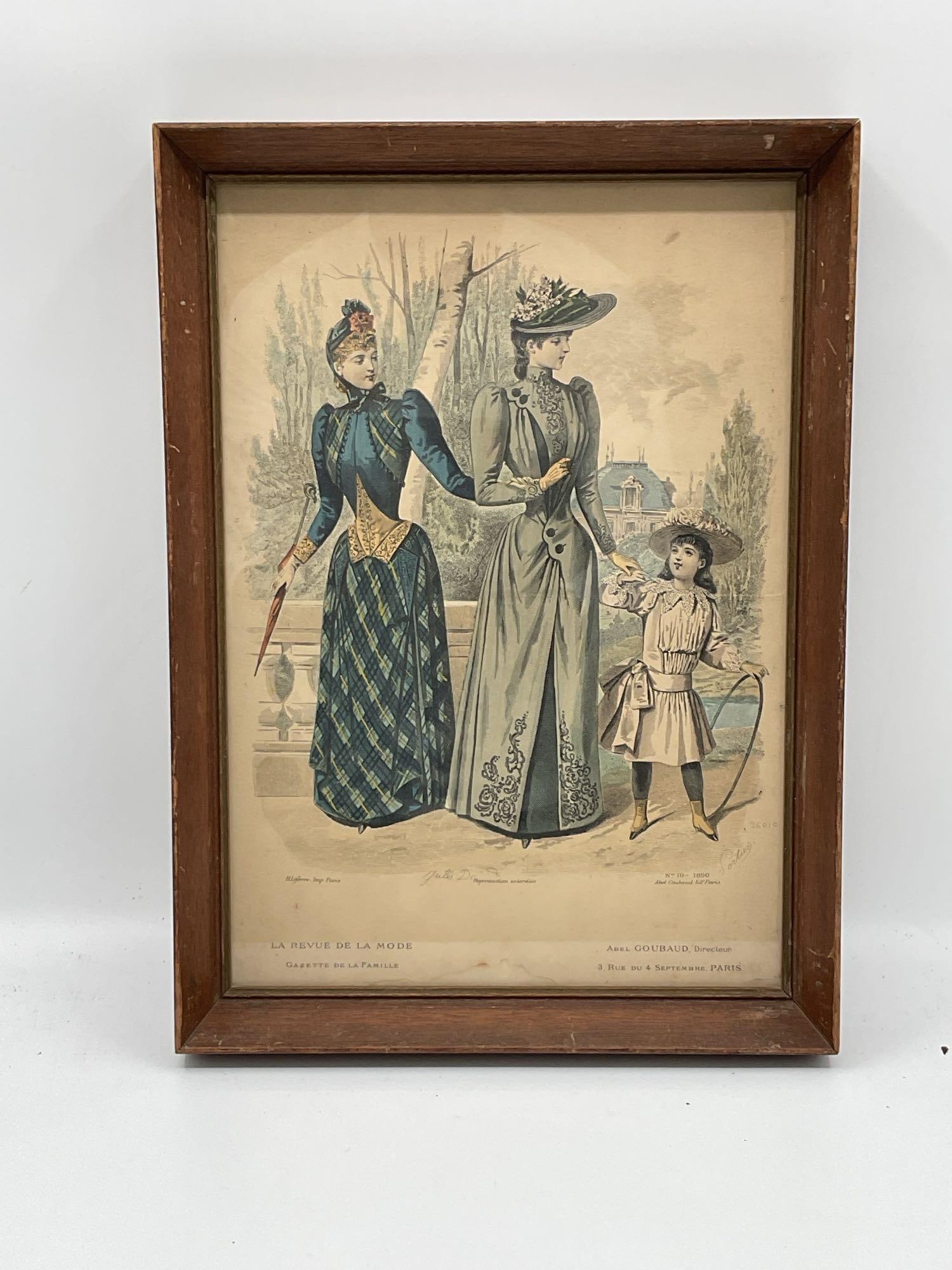 La Revue de la Mode Antique French Engraving: V Finely detailed hand-colored fashion print from La Revue de la Mode, showcasing two elegantly dressed women and a young girl in late 19th-century Parisian attire. The women's dresses feature ela