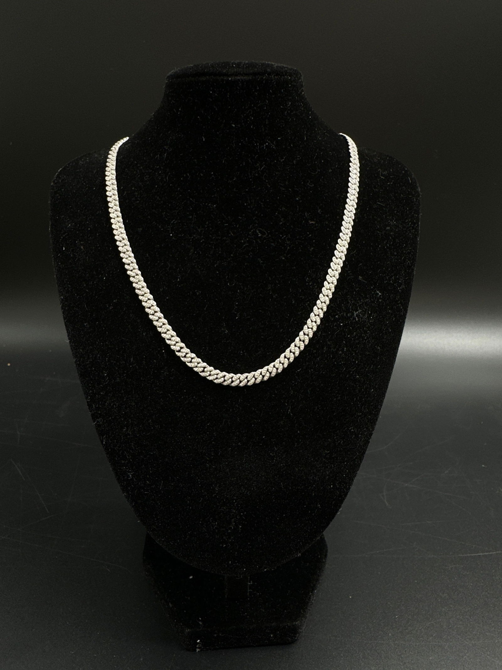 18kt Diamond Cuban Link Chain: Bold 18kt gold Cuban link chain featuring approximately 6 ct of diamonds in prong settings, measuring 16” long. Striking design, excellent condition. An ideal choice for luxury statement jewelry