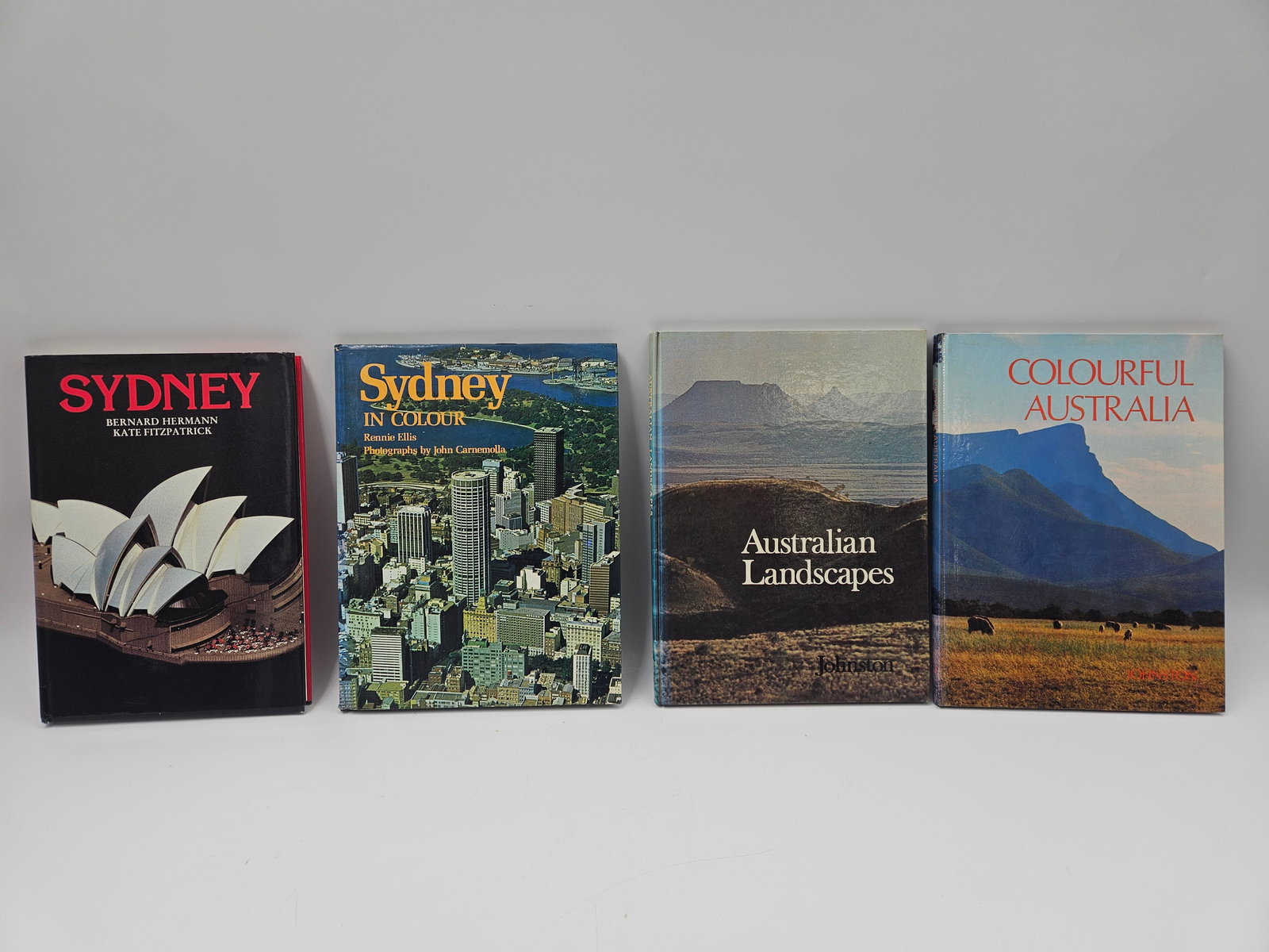 Set of 4 Australian Photography and Travel Books: Collection of four large-format photography and travel books showcasing the beauty of Australia, including Sydney, Sydney in Colour,