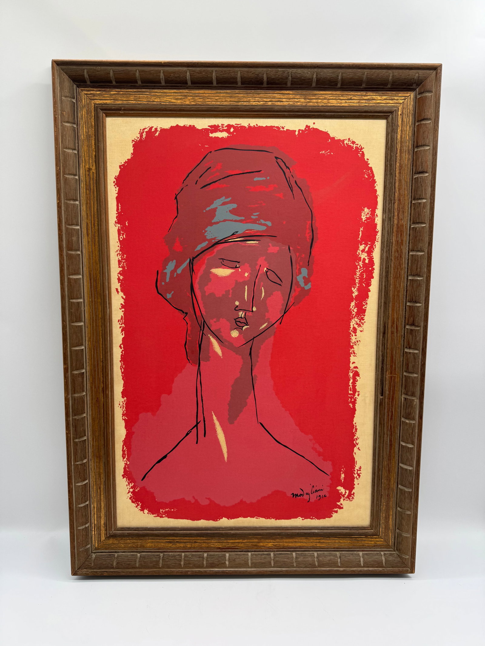 "Tete de Femme" by Amedeo Modigliani (Italy, 1884-1920) Screenprint: Description: Framed print Amedeo Modigliani's "Tete de Femme". The print features a stylized bust of a woman with elongated features, consistent with Modigliani's signature styl