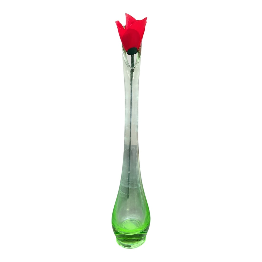 Art Glass Bud Vase with Red Flower Insert: This elegant art glass bud vase features a tall, slender silhouette with a gently tapered neck and a softly weighted base accented in green glass. The clear body highlights the graceful form and is