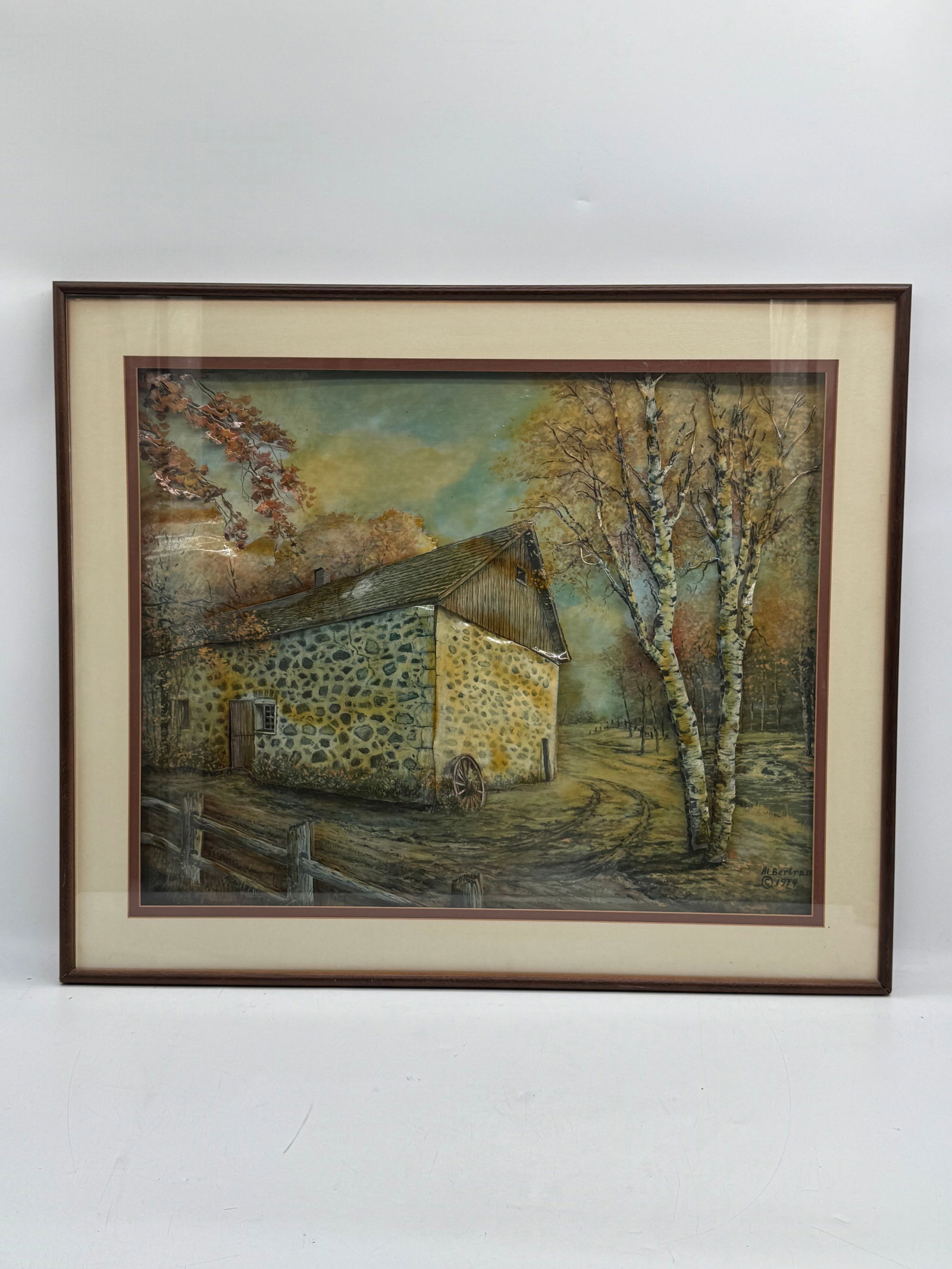 Al. Bertram (American, 1923-2000) Lithograph: Mixed media artwork by Al. Bertram, dated 1974. Depicts a stone house and trees in a landscape setting. Signed and dated lower right. Framed, measuring 36 x 30 inches.