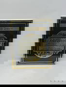 Framed Jekel Vineyard Johannisberg Riesling Wine Label: Description: Framed wine label art featuring a Jekel Vineyard Johannisberg Riesling label from 1981. The piece is framed in gold tone metal. Dimensions: 17 x 21.5 inches.