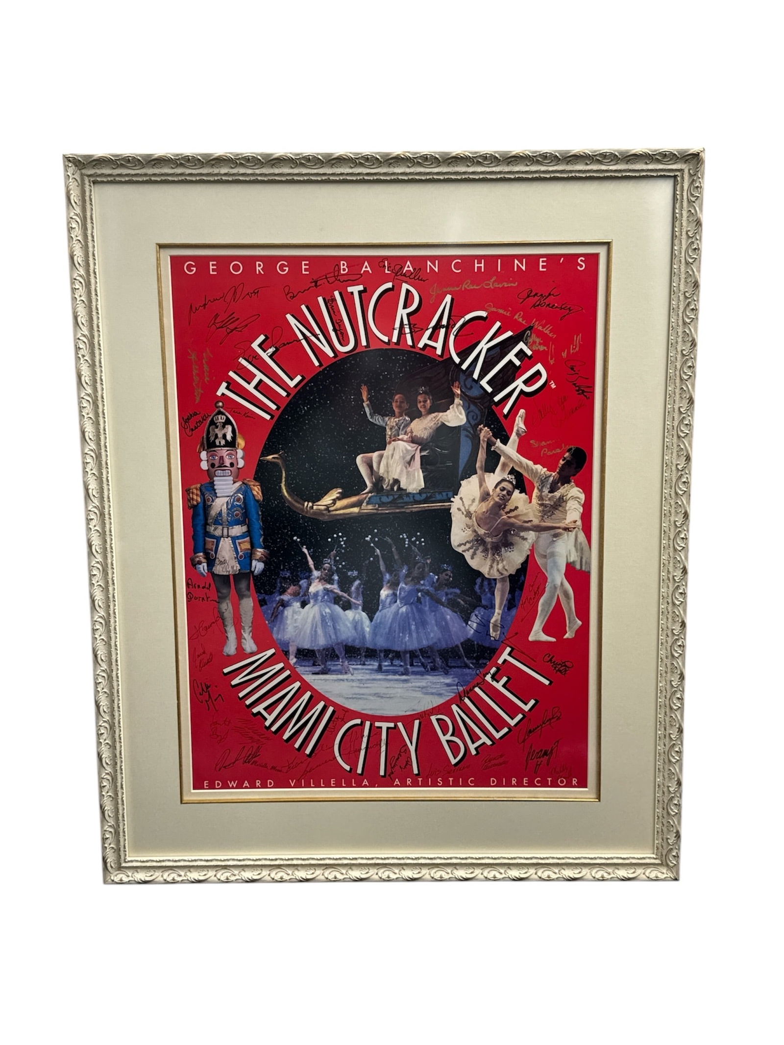 George Balanchine’s The Nutcracker Miami City Ballet Framed Poster Signed by Cast: This large framed poster celebrates George Balanchine’s The Nutcracker as performed by Miami City Ballet. The vibrant design features iconic scenes and characters from the ballet, including
