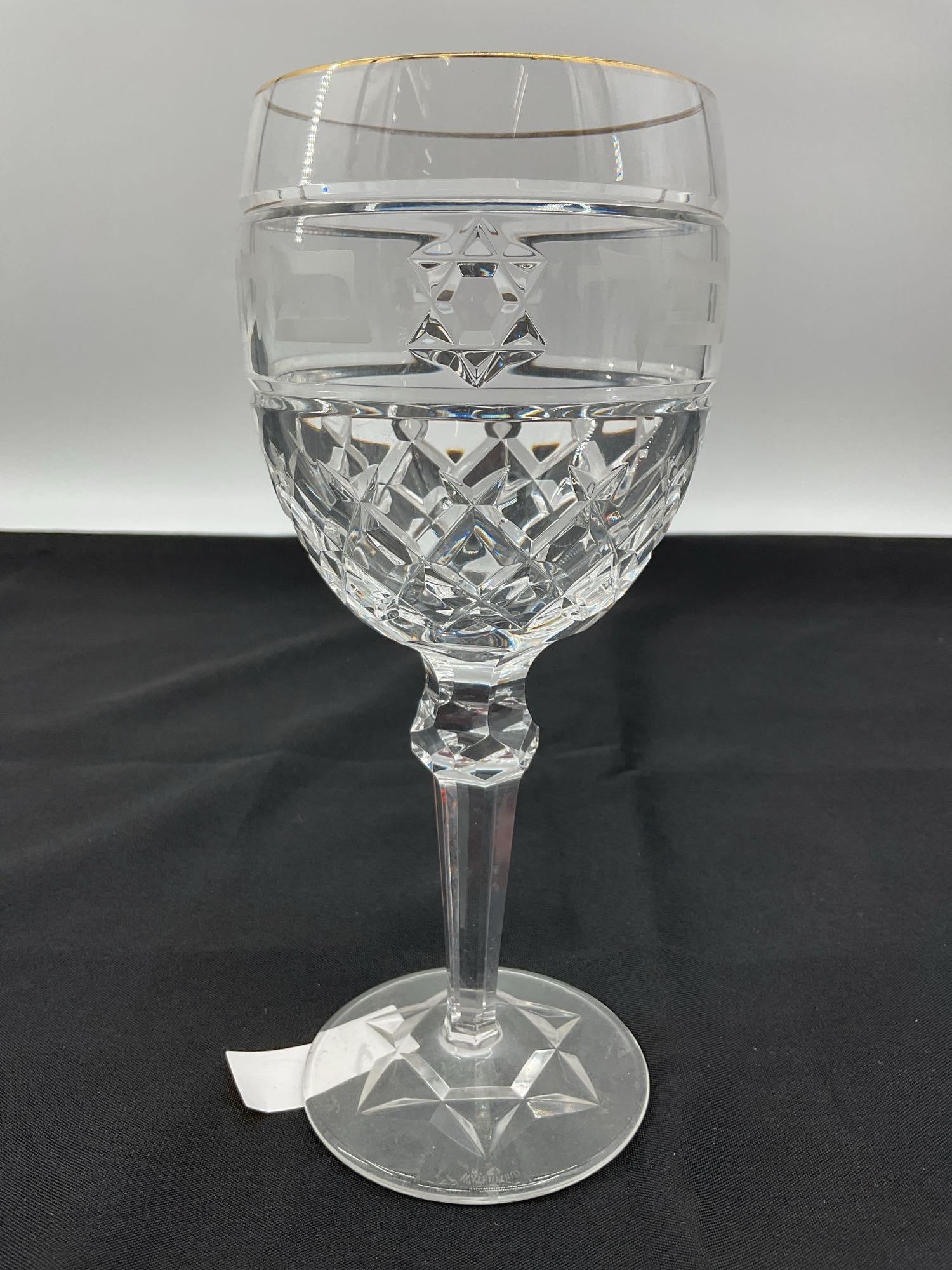 RARE 2Waterford Crystal Kiddush Goblet with Hebrew Etching: Elegant Waterford crystal goblet etched with Hebrew text and a Star of David. Features a cut crystal stem and a faceted star design on the base. Rimmed with a thin gold accent. Custom religious engrav