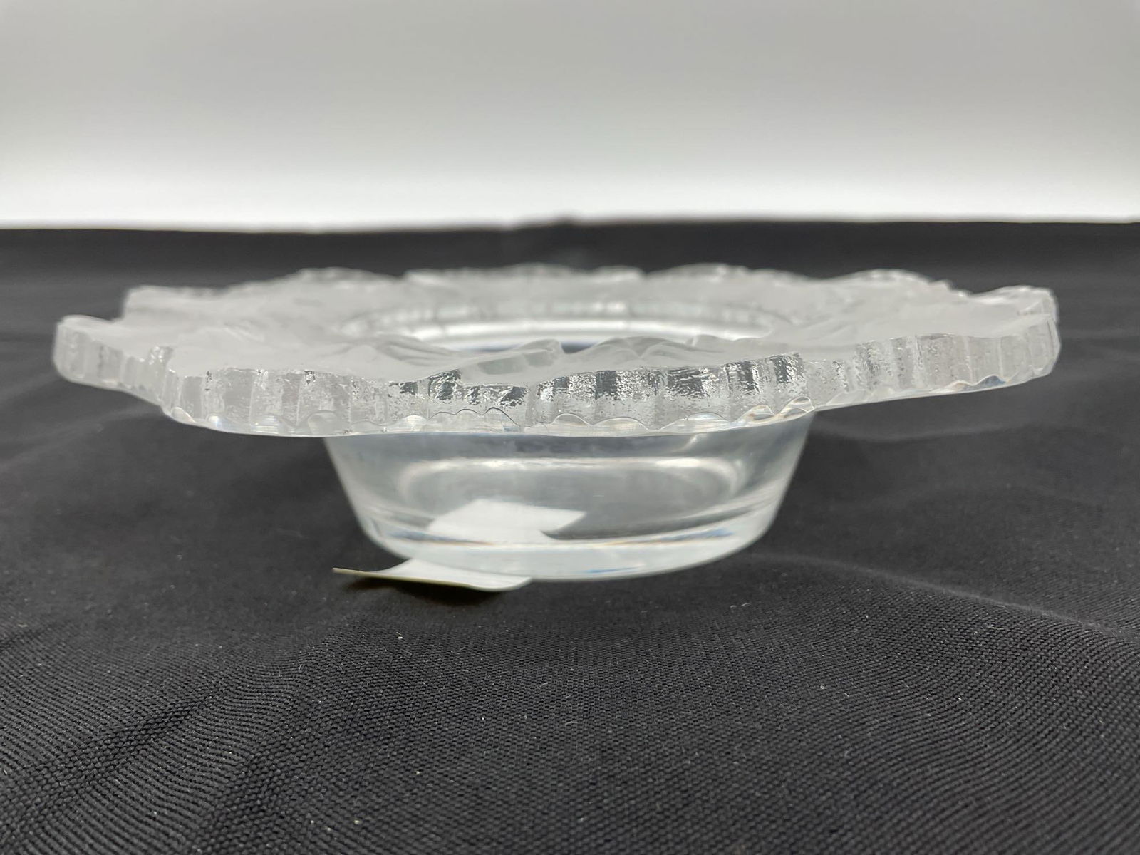 Lalique France Crystal Ginkgo Votive Holder: Frosted and clear crystal votive holder by Lalique, decorated with overlapping ginkgo leaves around the rim. Finely detailed leaf veins enhance the floral motif, forming a scalloped edge. Dimensiobs:
