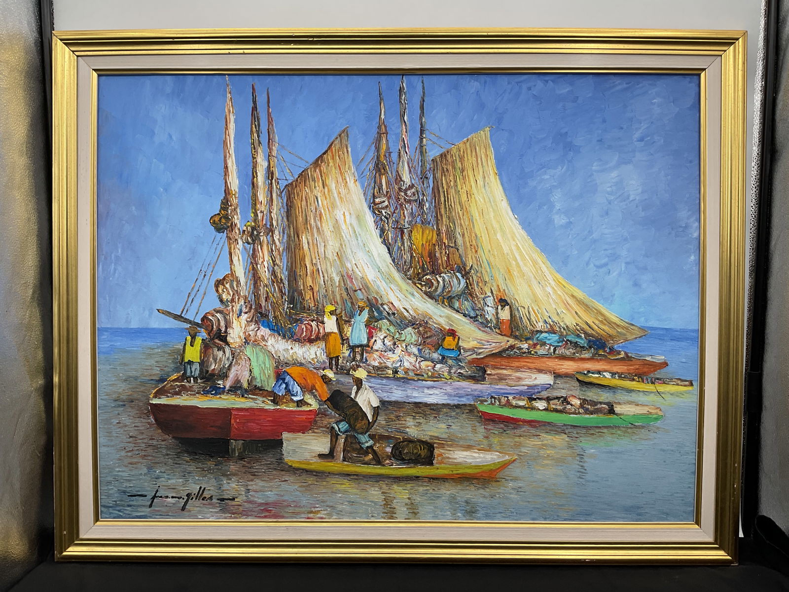Jean Madsen Gilles Haitian Oil in Canvas: Description: Impressionist oil painting depicting ships at sea with figures aboard. Framed. Medium: Oil canvas Dimensions: H:35in W:45in 