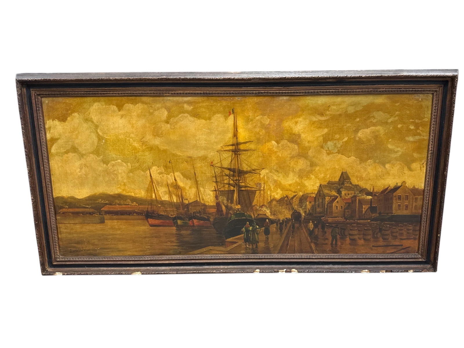 Emile Louis Vernier (France, 1829-1887) Oil on Canvas: Atmospheric harbor scene painting by Emile Louis Vernier depicting sailing vessels docked along a waterfront with historic buildings lining the shore. Rendered in a warm, golden palette, the