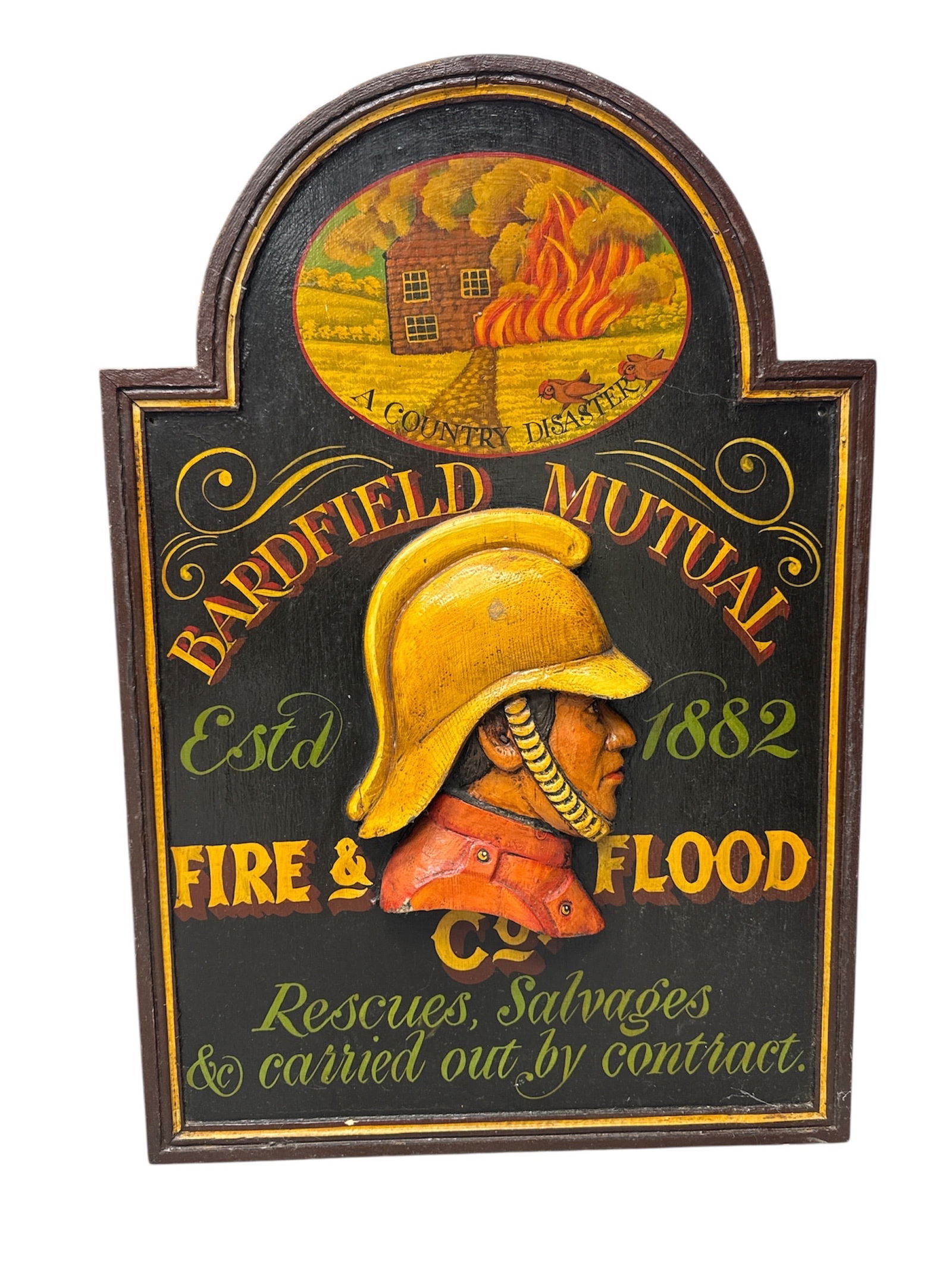 Antique Hand Painted Bardfield Mutual Fire and Flood Insurance Sign: Striking vintage hand painted wooden sign advertising Bardfield Mutual Fire and Flood insurance, featuring a central image of a firefighter’s helmet with fire and architectural imagery above.
