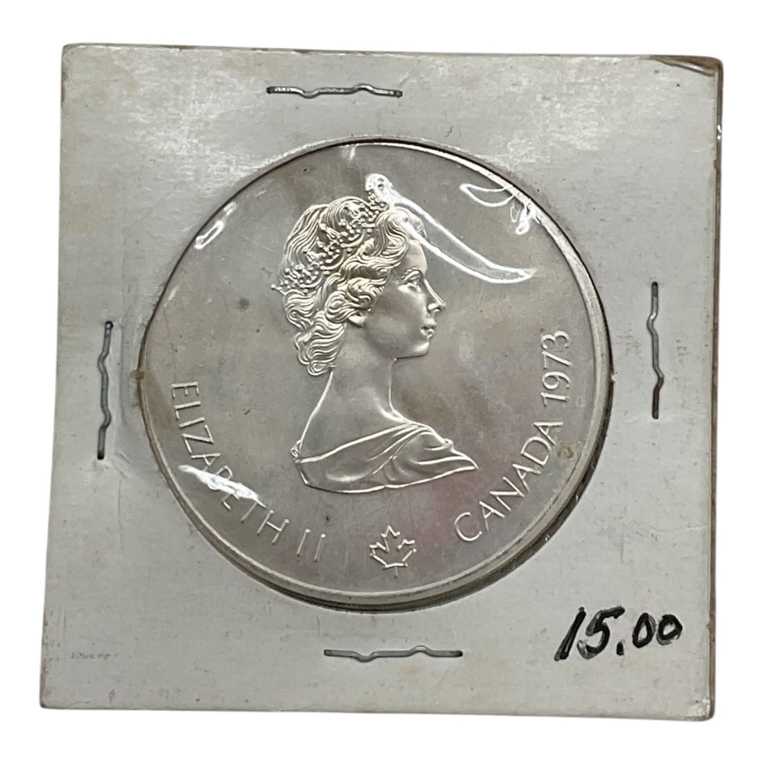 RARE 1973 Canada Elizabeth II Olympic Silver $10 Coin - .925 Sterling Silver - Uncirculated: Description This is an authentic Canadian commemorative coin issued in 1973 as part of the Series I Geographic colle