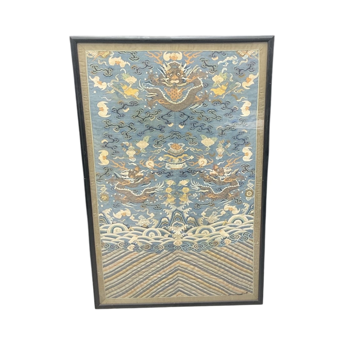 Antique Chinese Forbidden City Imperial Dragon Tapestry: Description: Large framed textile featuring imperial five-clawed dragons surrounded by clouds and waves, in the traditional style associated with the Forbidden City. The design mirrors motifs found