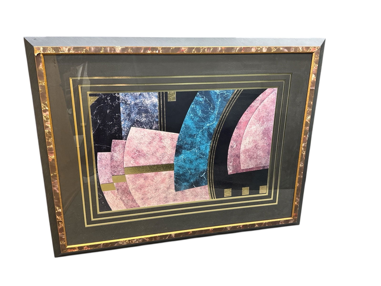 Framed Contemporary Abstract Geometric Mixed Media Artwork: This contemporary abstract artwork features a bold geometric composition with layered forms and sweeping curved elements set against a dark ground. Blocks of pink, mauve, black, and textured blue crea