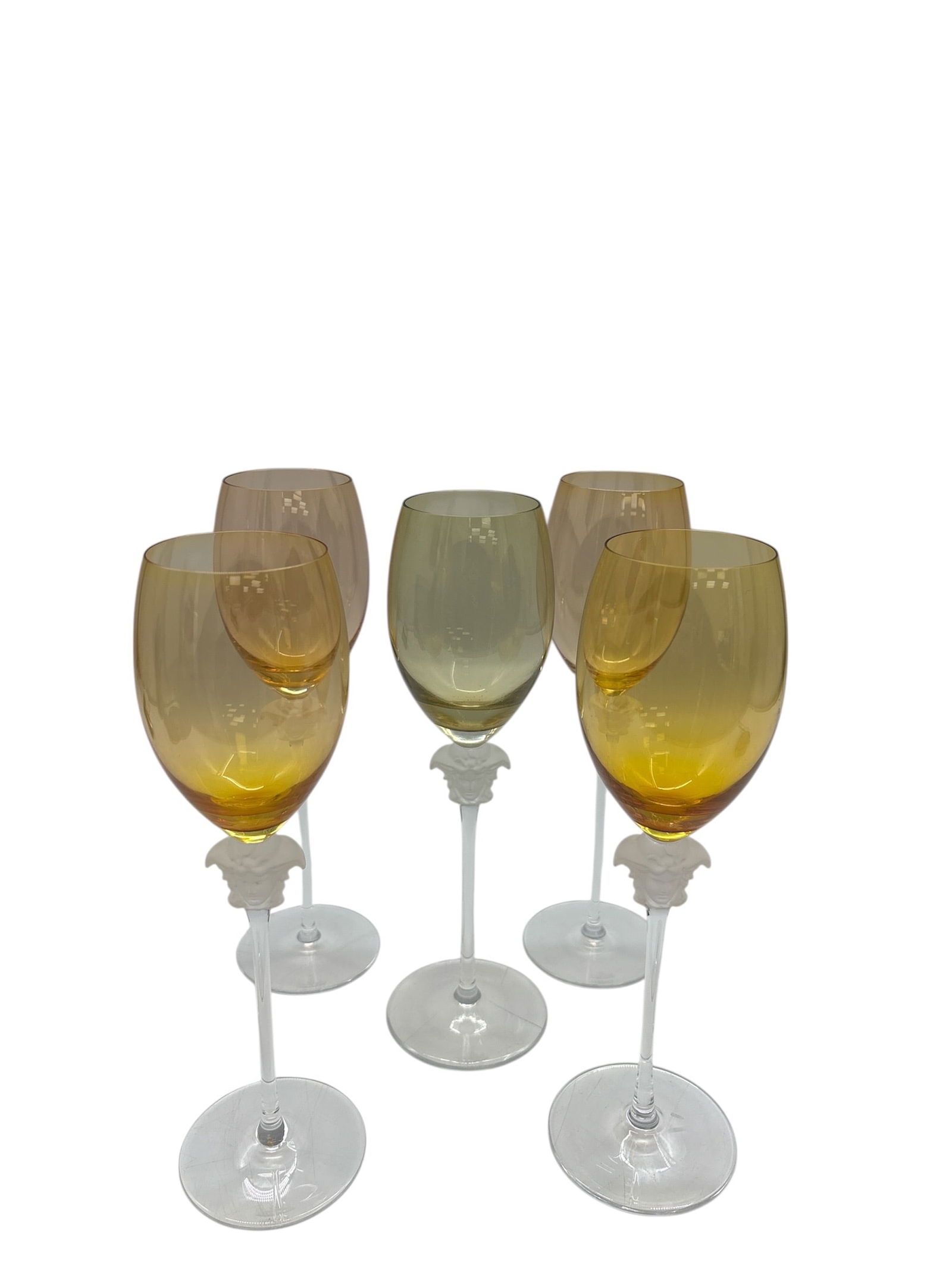 Set of Five (5) Rosenthal Meets Versace "Medusa Lumiere" Amber Crystal Wine Glasses: Description:Elevate your collection with this exquisite set of five (5) Rosenthal Meets Versace "Medusa Lumiere" crystal wine glasses. Crafted from fine, high-quality crystal,