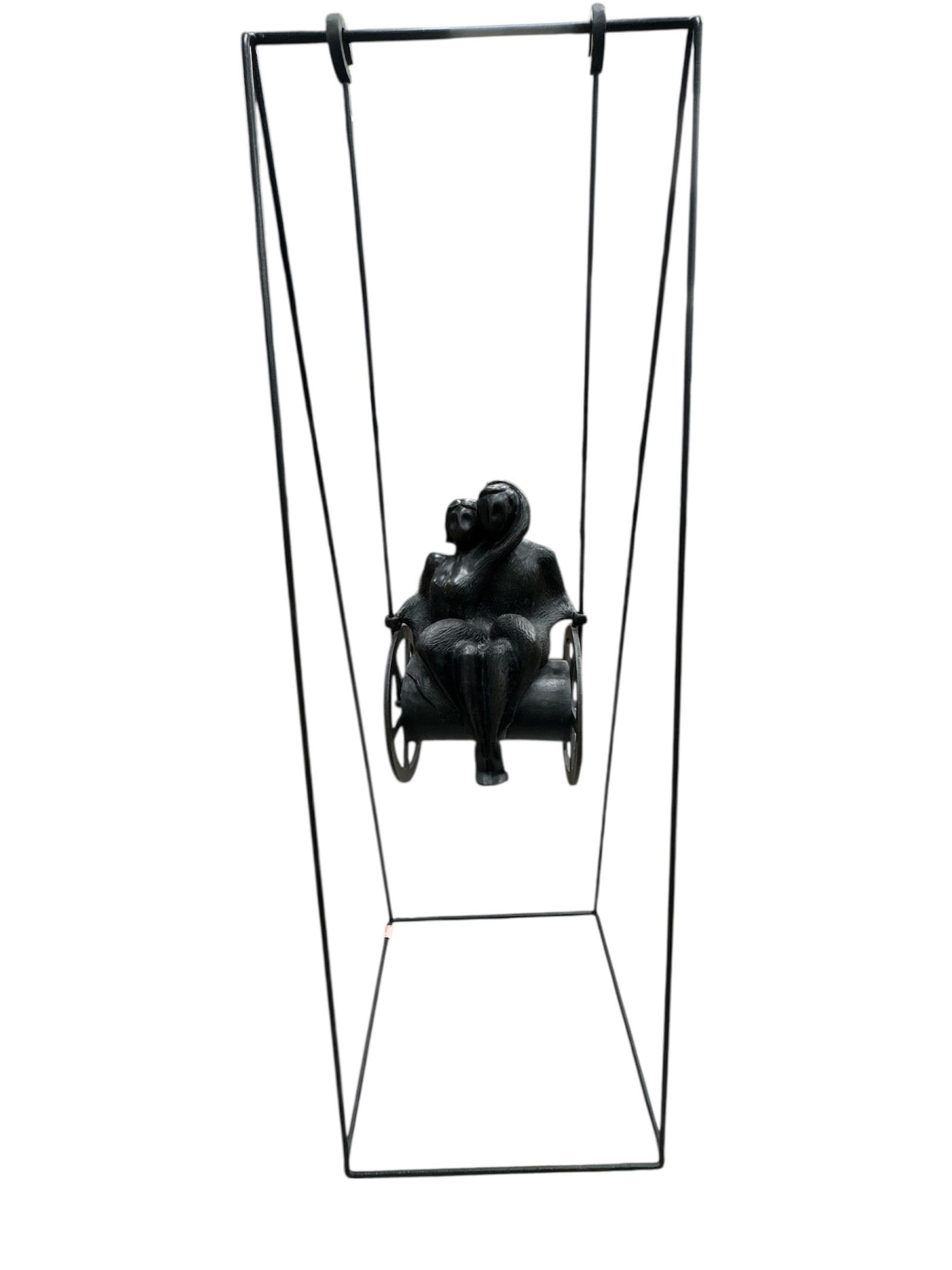 Julio Cesar Briceno (Venezuela, b.1950) Bronze Swing: This monumental bronze sculpture by Julio Cesar depicts an intimate seated couple embraced together on a suspended swing-like structure. The figures are rendered in a stylized, rounded form with textu