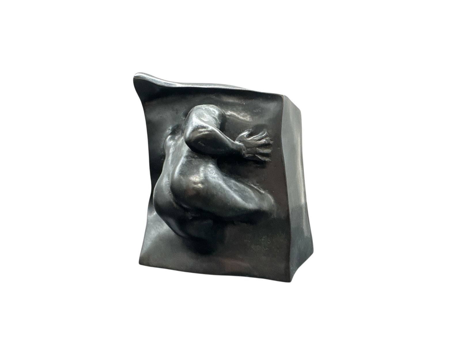 Marcos Fernandez Bronze Sculpture: This modern bronze sculpture presents an abstract figurative form emerging from a squared block-like base. The composition suggests a partially revealed human figure, rendered with smooth, flowing con