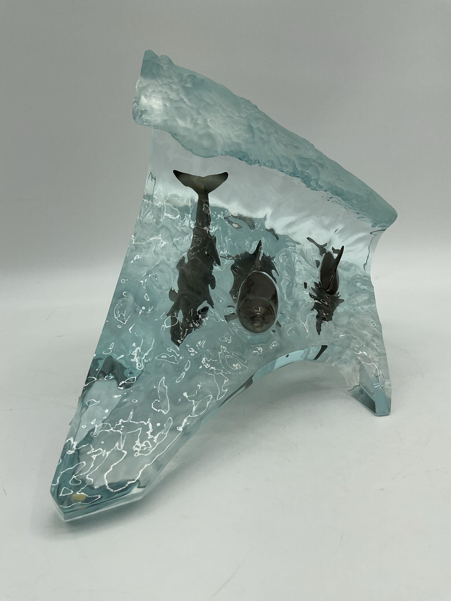 Wyland “The Wave?? Bronze Dolphins Sculpture in Lucite Wave: Striking Wyland sculpture titled Legacy, featuring a trio of patinated bronze dolphins swimming through a massive clear Lucite wave. This dynamic piece captures Wyland’s signature marine li
