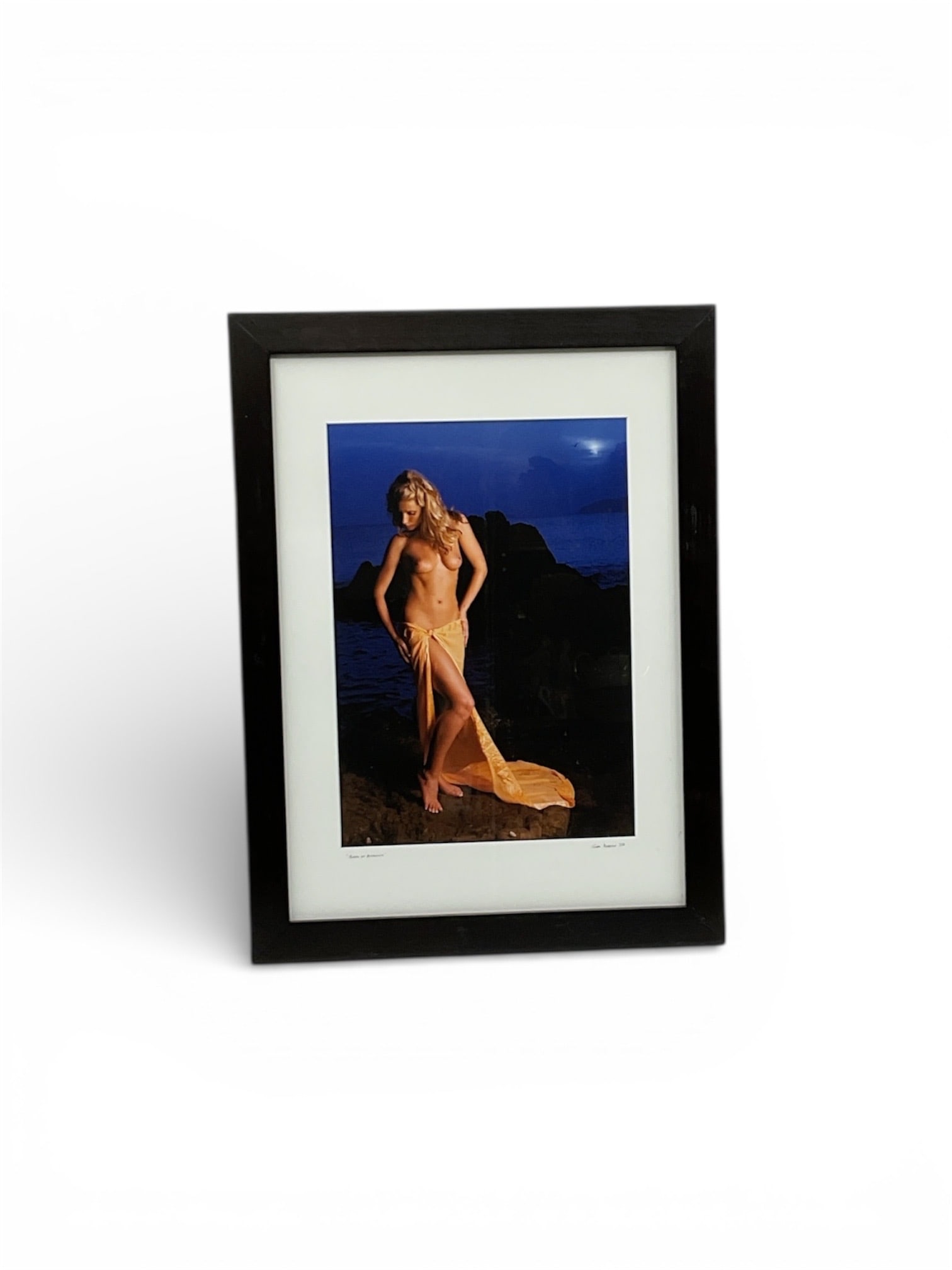 Sam Dobrow Birth of Aphrodite Signed Figurative Artwork 2008: Signed figurative artwork by Sam Dobrow titled Birth of Aphrodite, dated 2008. The composition depicts a nude female figure emerging from a rocky coastal landscape, draped in flowing golden fabric and