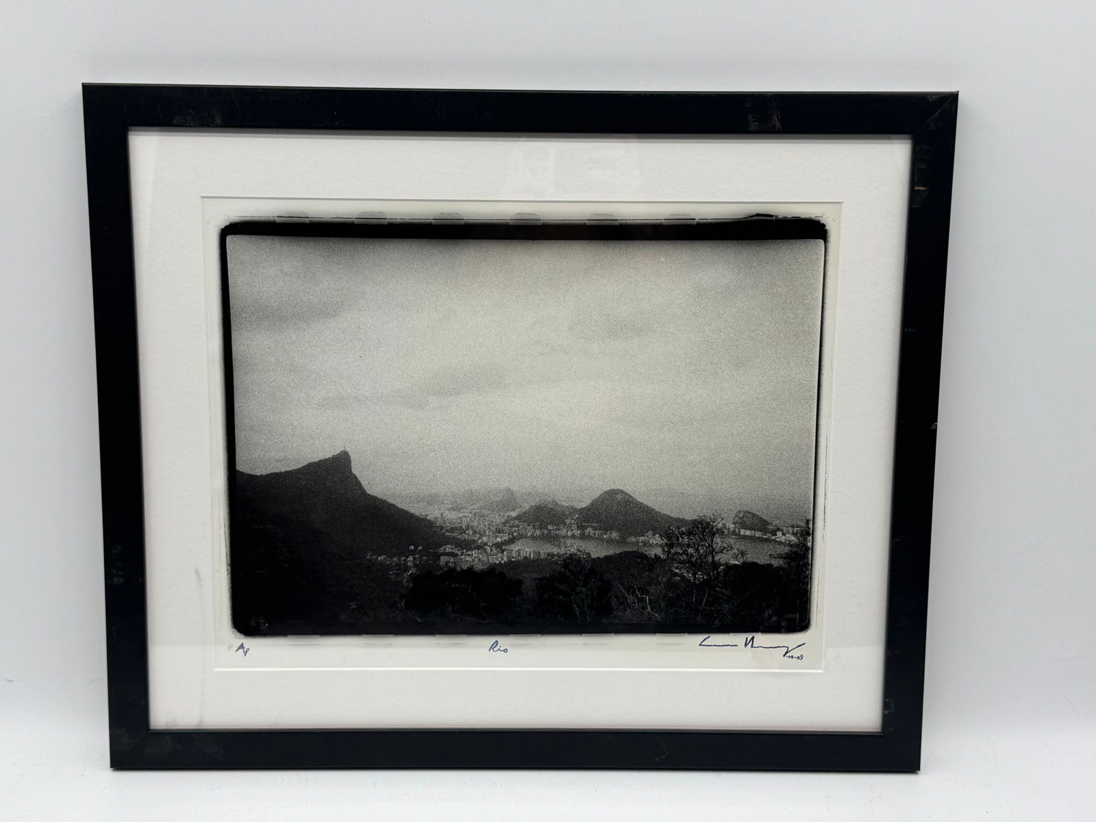 Rio de Janeiro by Elliott Erwitt (French/American, 1928-2023): Luiz Braga (Brazilian, b. 1956), 'Rio', gelatin silver print, signed and dated '10-09' lower right, titled 'Rio' lower center, numbered 4/5 lower left, framed.Medium: silver