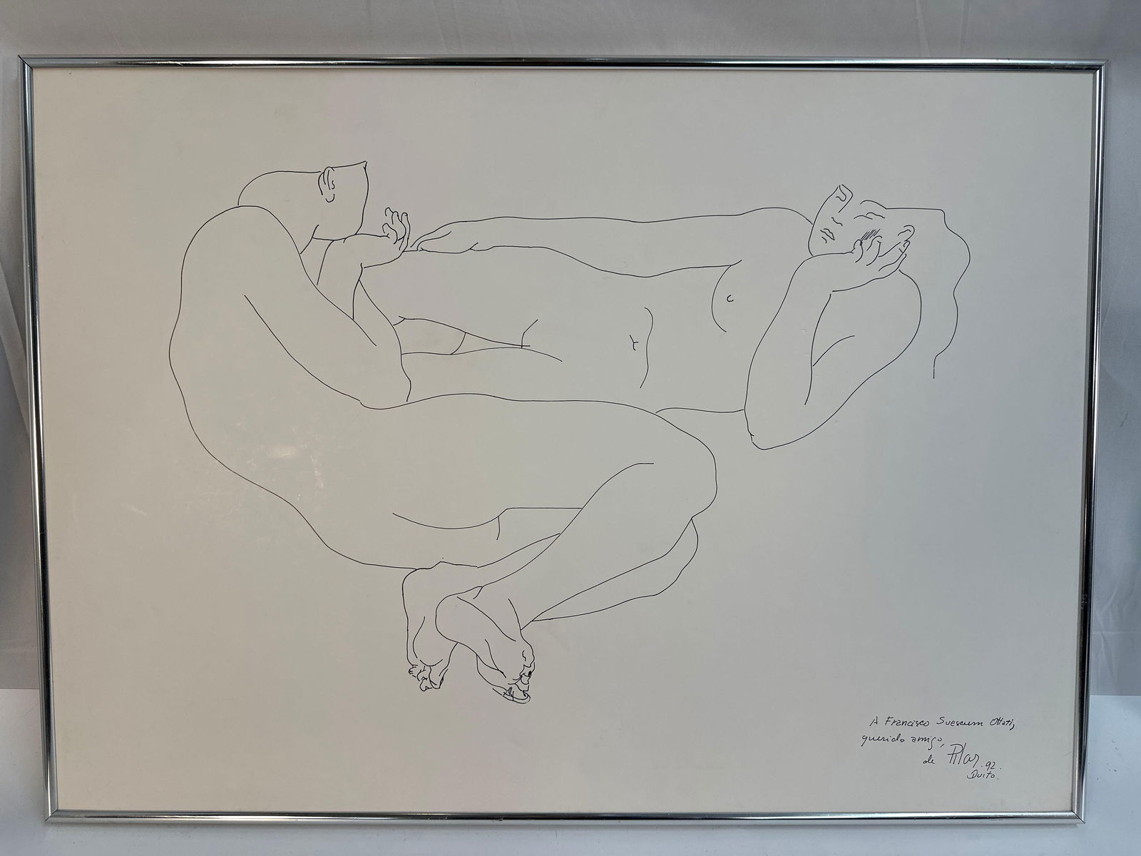 Pilar Bustos (Ecuador, b.1945) Ink Drawing: This minimalist line drawing by Ecuadorian artist Pilar Bustos captures the delicate form of a reclining nude figure. The simplicity of the continuous line technique highlights the natural curves and