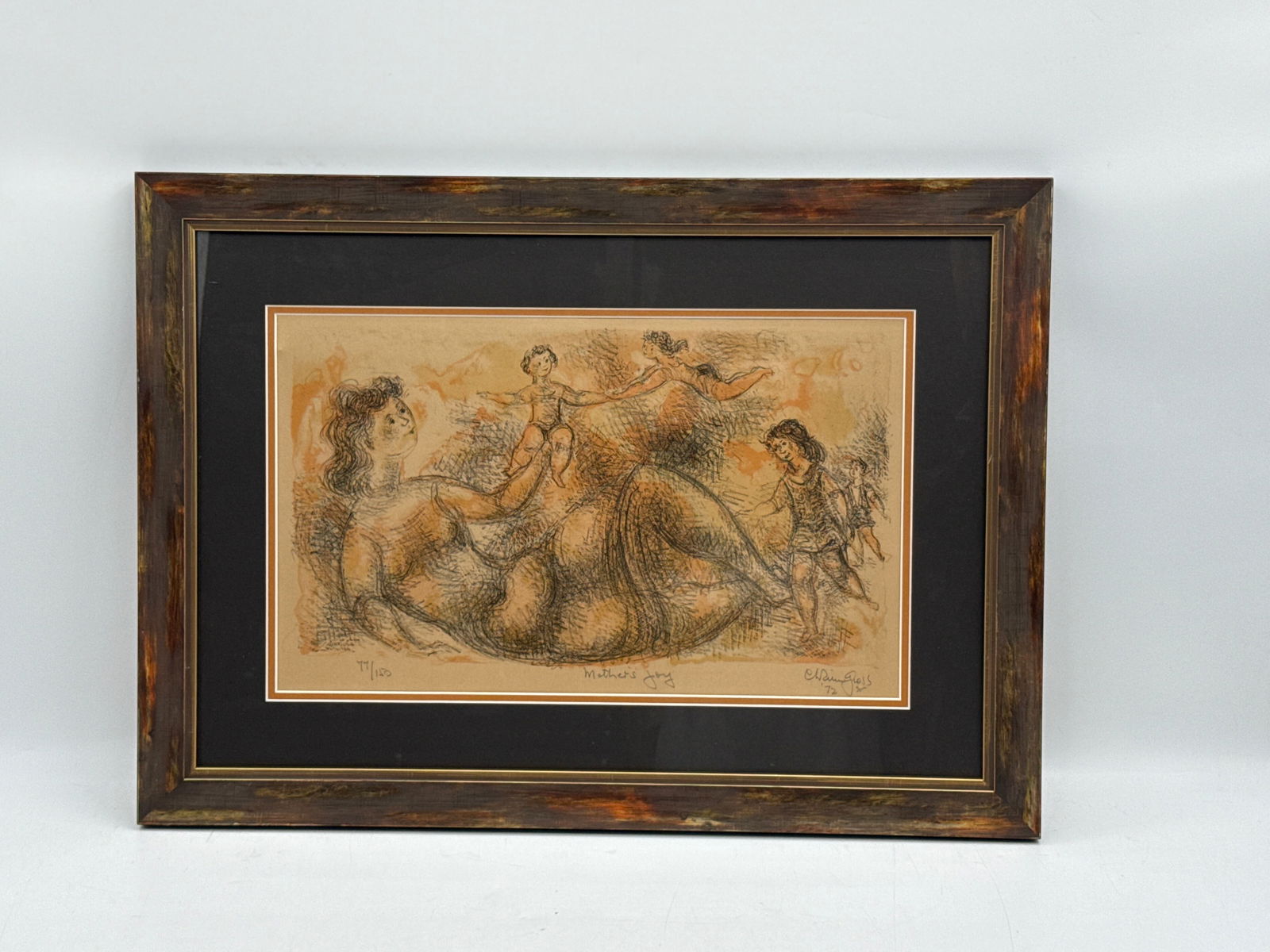 Chaim Gross 'Mother's Joy' Lithograph, 1972: Chaim Gross, 'Mother's Joy', 1972, lithograph, numbered 77/150, signed and dated lower right, titled lower left, framed. The image depicts a reclining woman surrounded by cherubic figures.