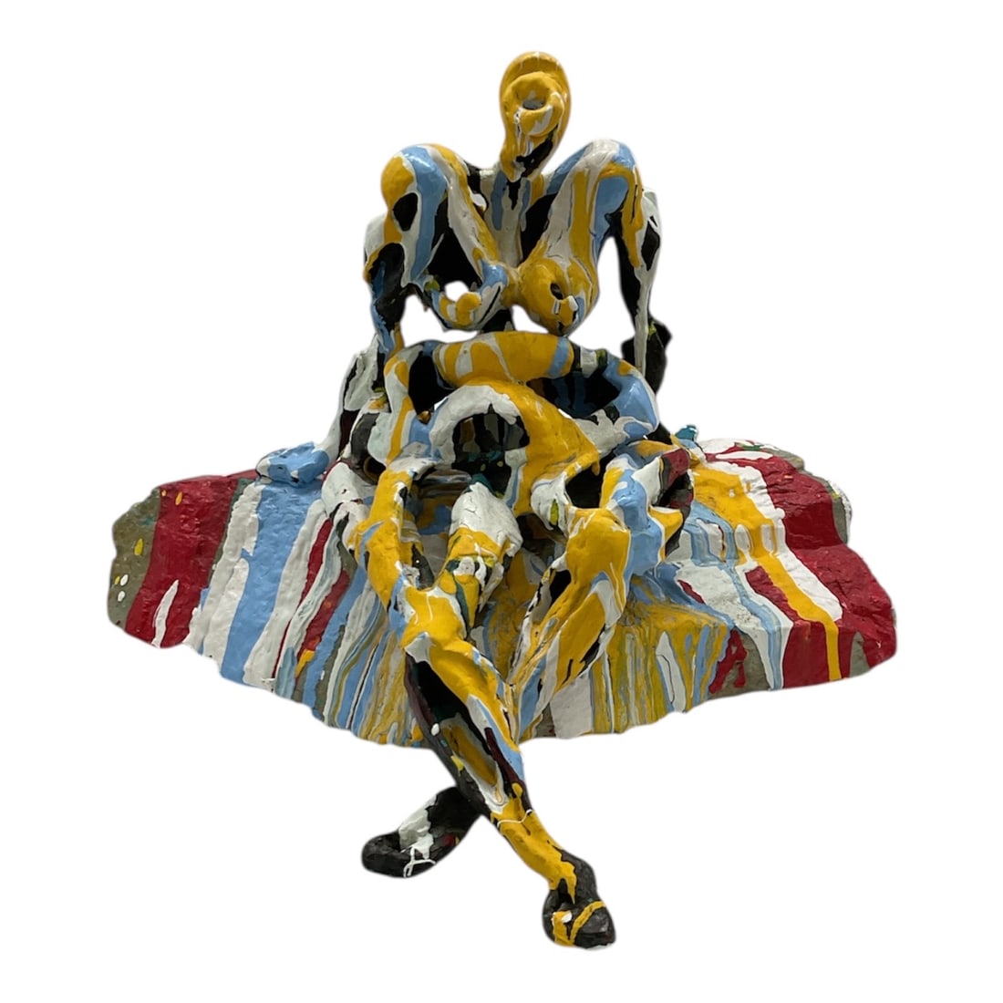 Contemporary Figurative Sculpture by Fernando Fernández: Expressive contemporary figurative sculpture by Fernando Fernández, depicting a seated dancer captured in a moment of poised motion. The stylized figure is modeled with exaggerated curves and d