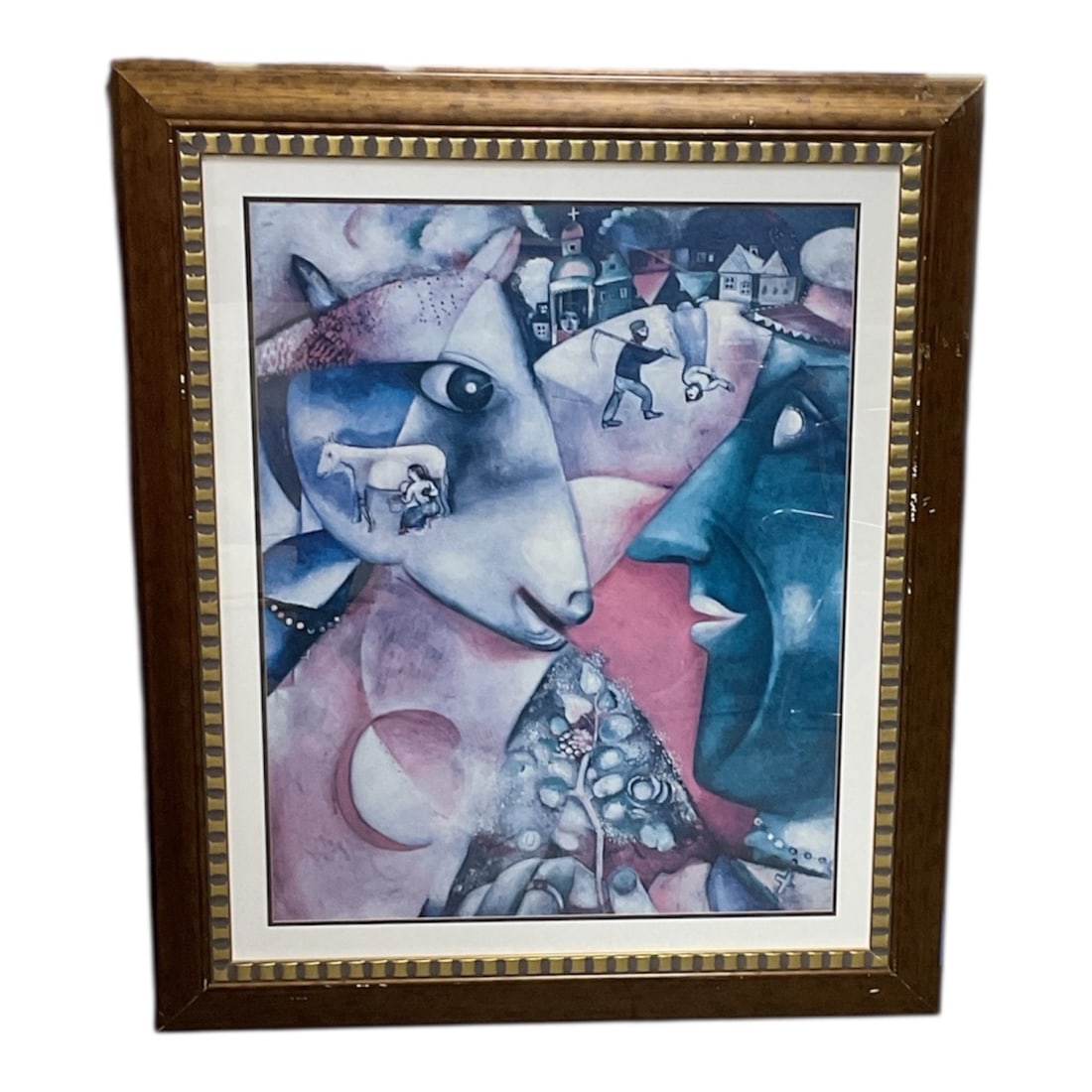 I and the Village" by Belarusian-French artist Marc Chagall 1911: Color lithograph on paper depicting a surrealist village composition featuring a prominent goat, stylized figures, and architectural elements rendered in soft pastel tones. The dreamlike imagery,