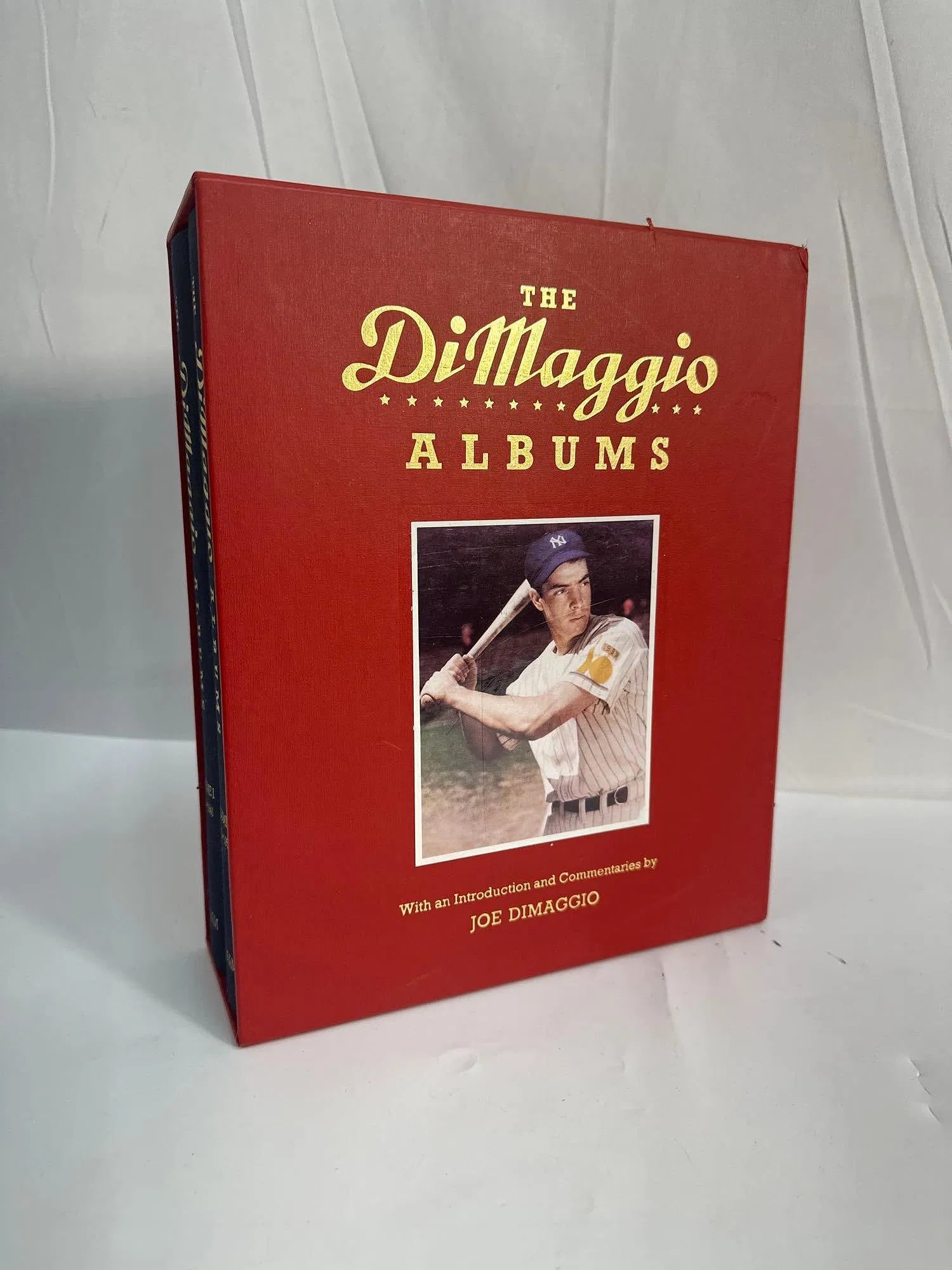 2 Volume The DiMaggio Albums Collector’s Set: A complete two-volume set of The DiMaggio Albums, published by Putnam, chronicling Joe DiMaggio’s legendary baseball career from 1932 to 1951. These books include rare photographs, newspaper