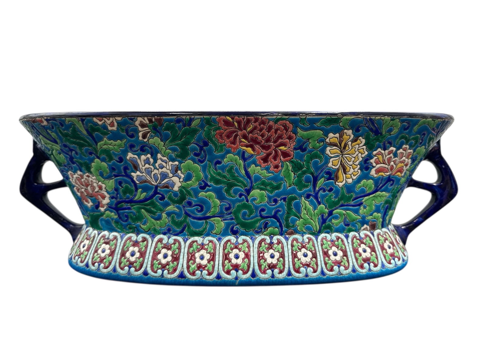 Longwy French Cloisonné Style Floral Centerpiece Bowl with Handles: This vibrant French decorative bowl is produced by Longwy and features richly enameled cloisonné style floral decoration in bold shades of cobalt blue, green, red, and yellow. The exterior is a