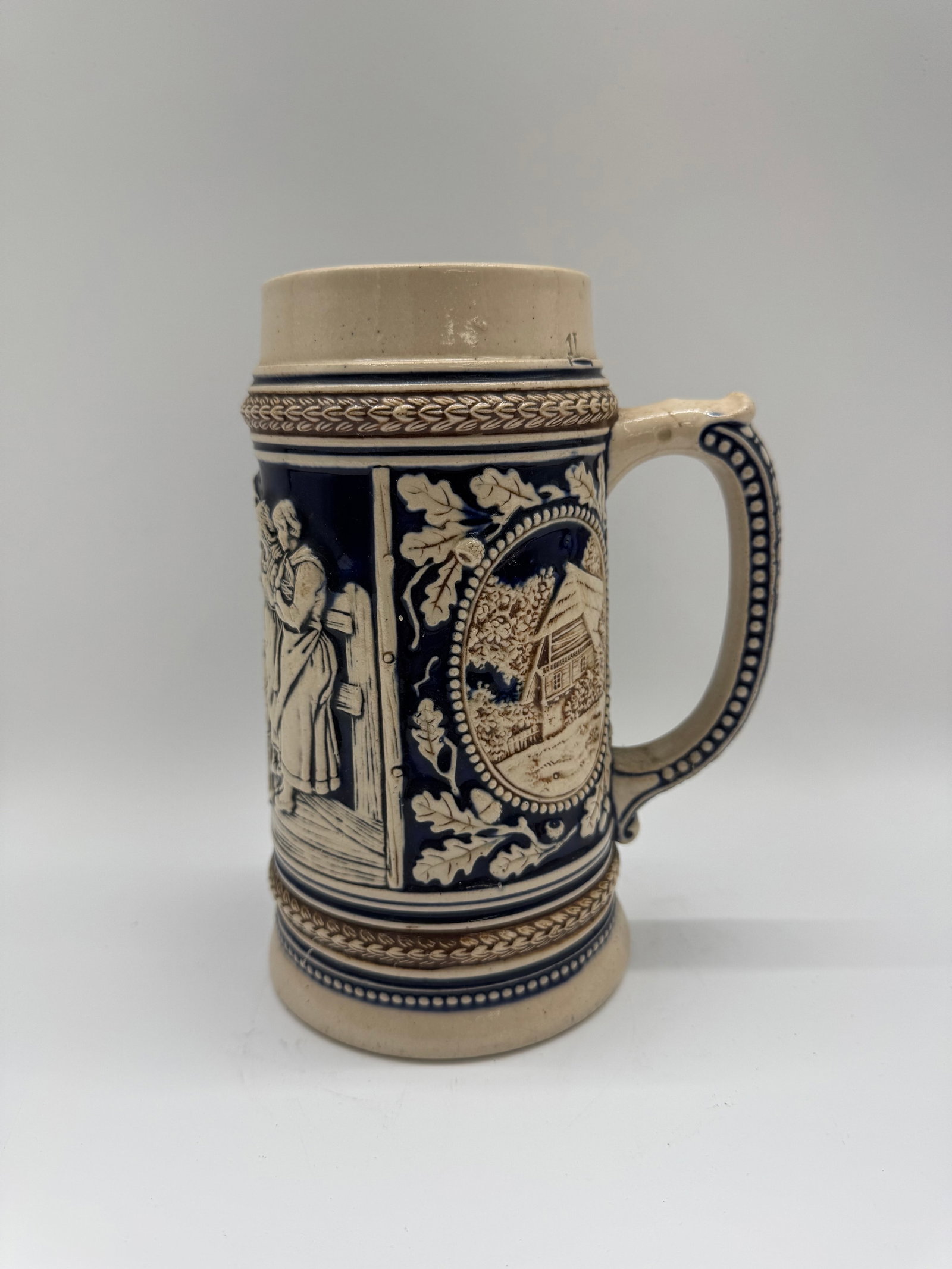 Vintage German-Style Beer Stein with Tavern & Cottage Scenes, Cobalt and Cream Relief (1 of 5)