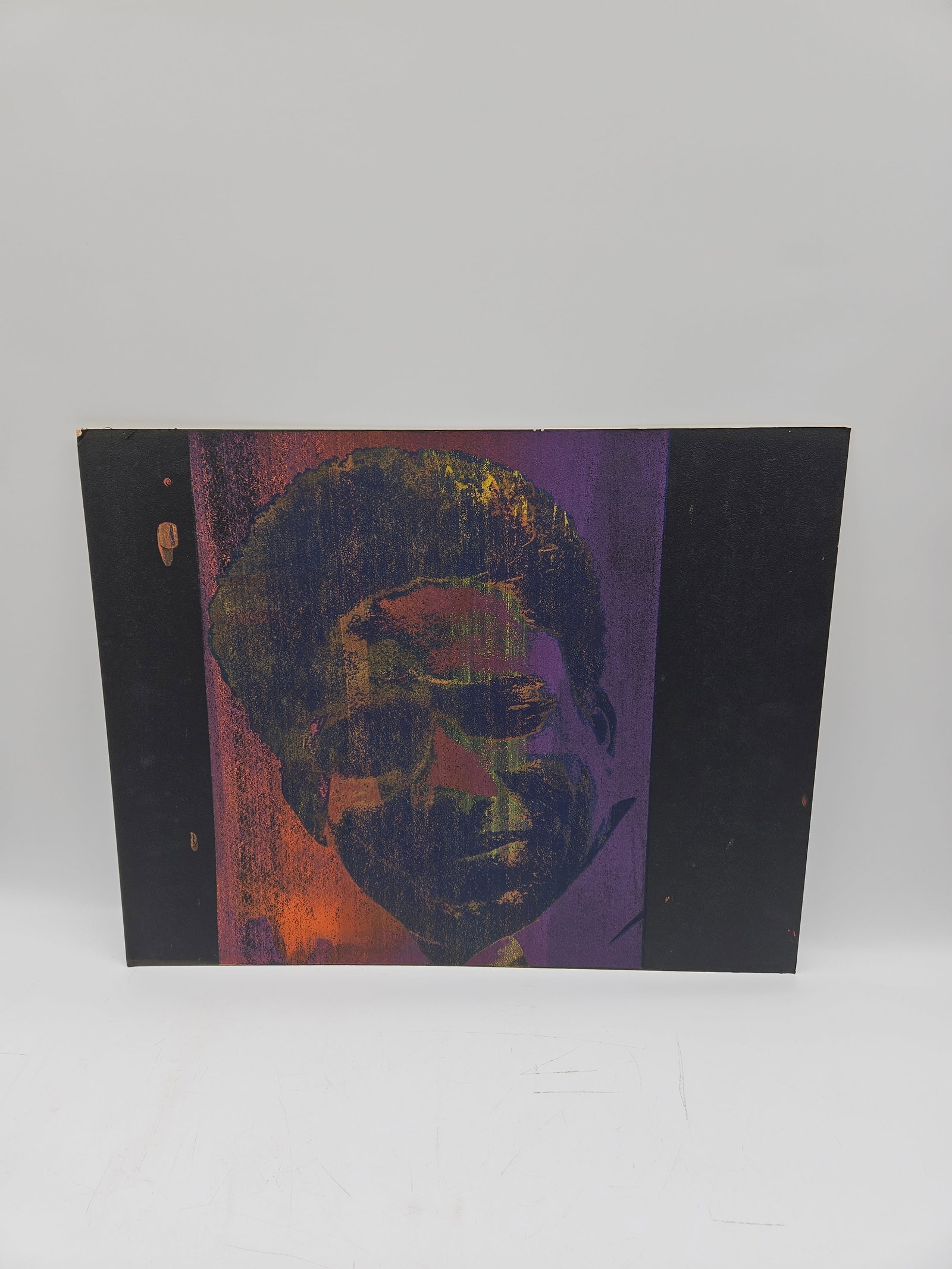 Abstract Portrait: Abstract portrait painting on board. Possibly of Huey Newton Dimensions: 20" height x 25 1/2" length.