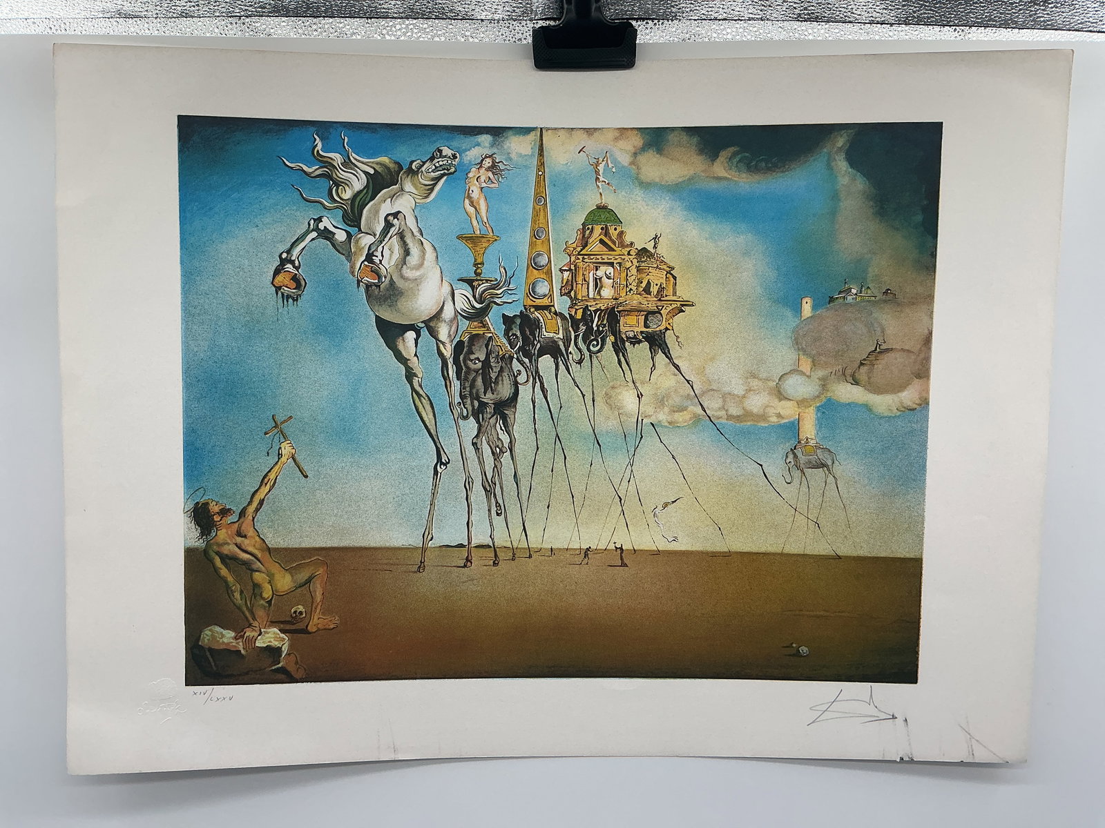 SALVADOR DALI (AFTER), TEMPTATION OF ST. ANTHONY: Description Item DetailsDescriptionSalvador dali (After)TEMPTATION OF ST. ANTHONYLithographFacsimile Signed, Lower RightPencil numbered from the edition of 500 lower left, please note the edition numb