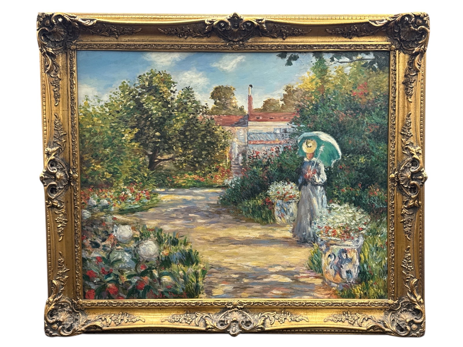 Claude Monet Impressionist Garden Scene Oil Painting: Oil painting depicting a lush garden path bordered by flowering plants and trees, with a woman holding a parasol in the foreground and architectural elements beyond. Executed in a loose, impressionist