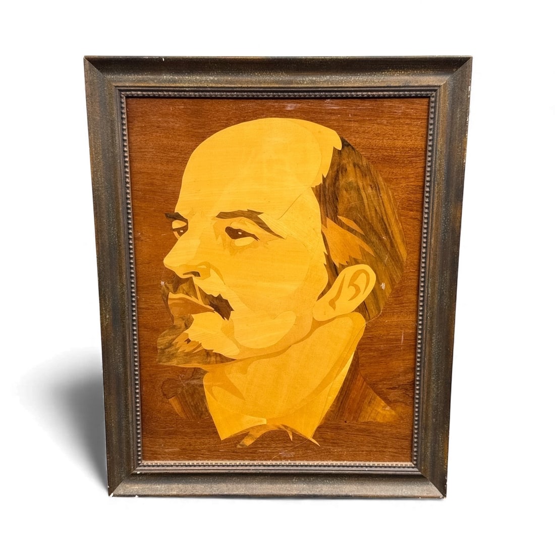 Lenin Portrait Marquetry Inlaid Wood: Marquetry inlaid wood portrait of Vladimir Lenin, framed. Height: 28 inches, Length: 22.5 inches.