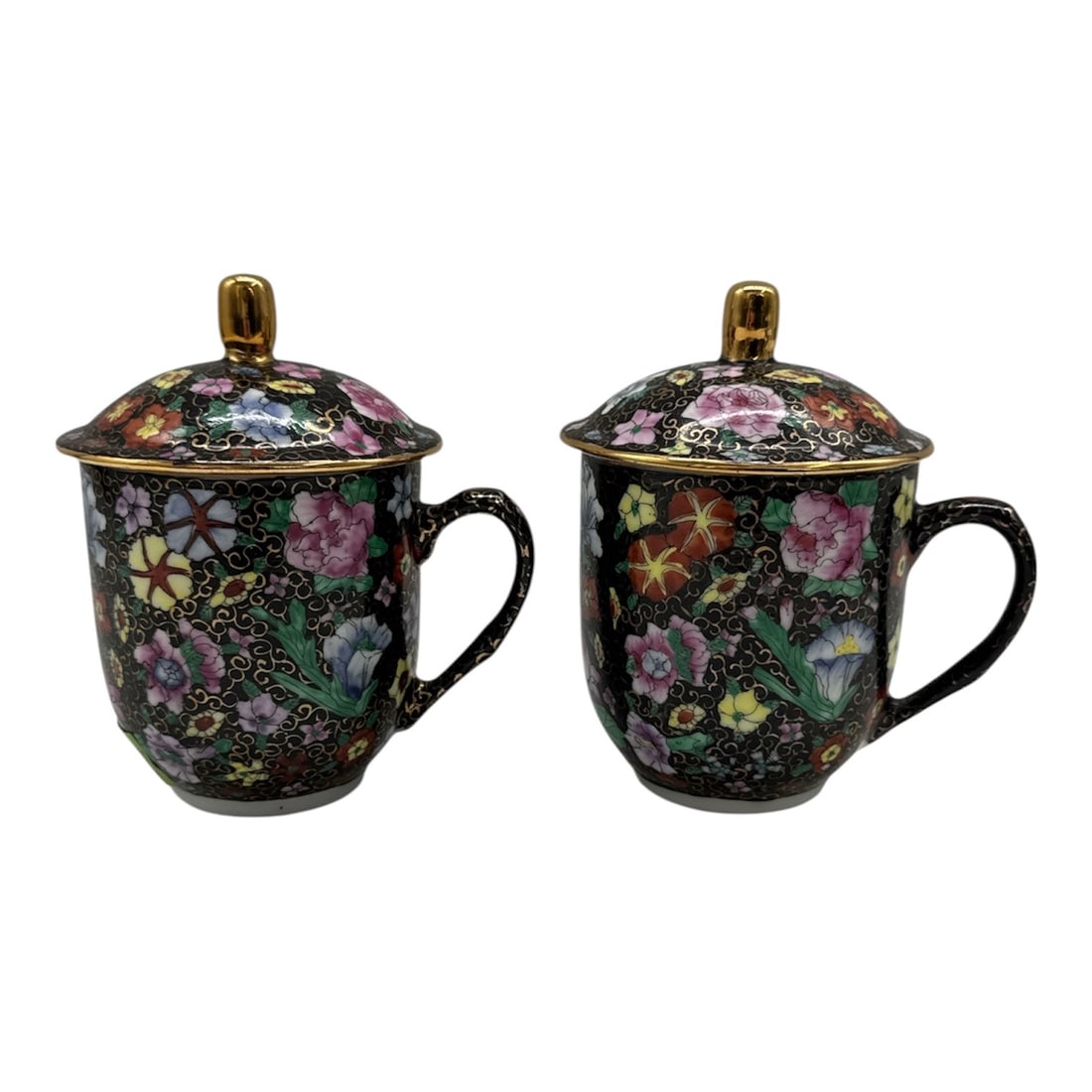 Pair of Chinese Hand-Painted Floral Lidded Tea Cups Black Ground: Decorative pair of Chinese porcelain lidded tea cups, each featuring a richly colored hand-painted floral motif against a black ground with gilt accents. The cups include matching lids with finial top