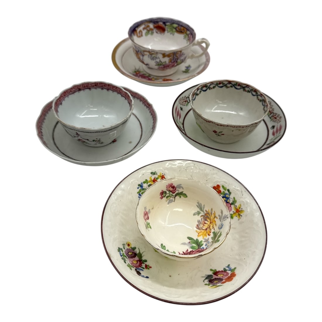 Group of Four Decorative Porcelain Cup and Saucer Sets (1 of 3)