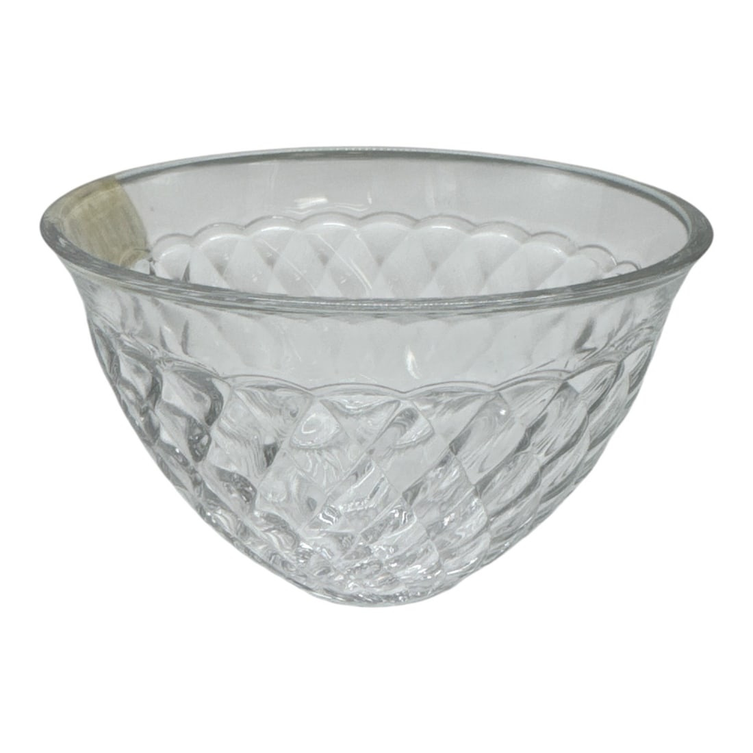 Cut Glass Bowl with Diamond Pattern: Charming clear cut glass bowl featuring an allover diamond and fan pattern with a gently flared rim. The faceted design catches the light beautifully, making it ideal for use as a small serving bowl,