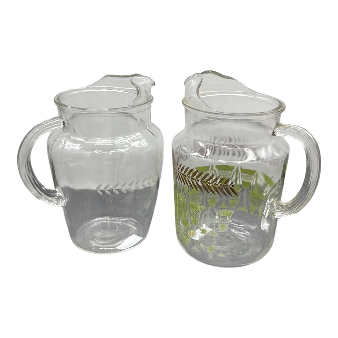 Pair of Clear Glass Etched Pitchers (1 of 3)