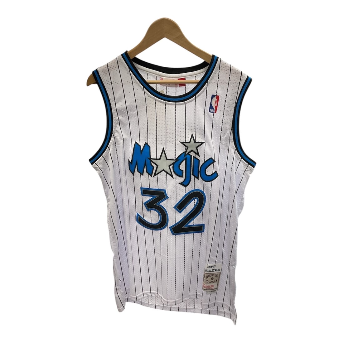 Orlando Magic Shaquille O'Neal Autographed Hardwood Classics Jersey 1994–95: This Mitchell & Ness Hardwood Classics Orlando Magic jersey commemorates Shaquille O’Neal’s 1994–95 season and features the iconic white pinstripe design with the number 32. The