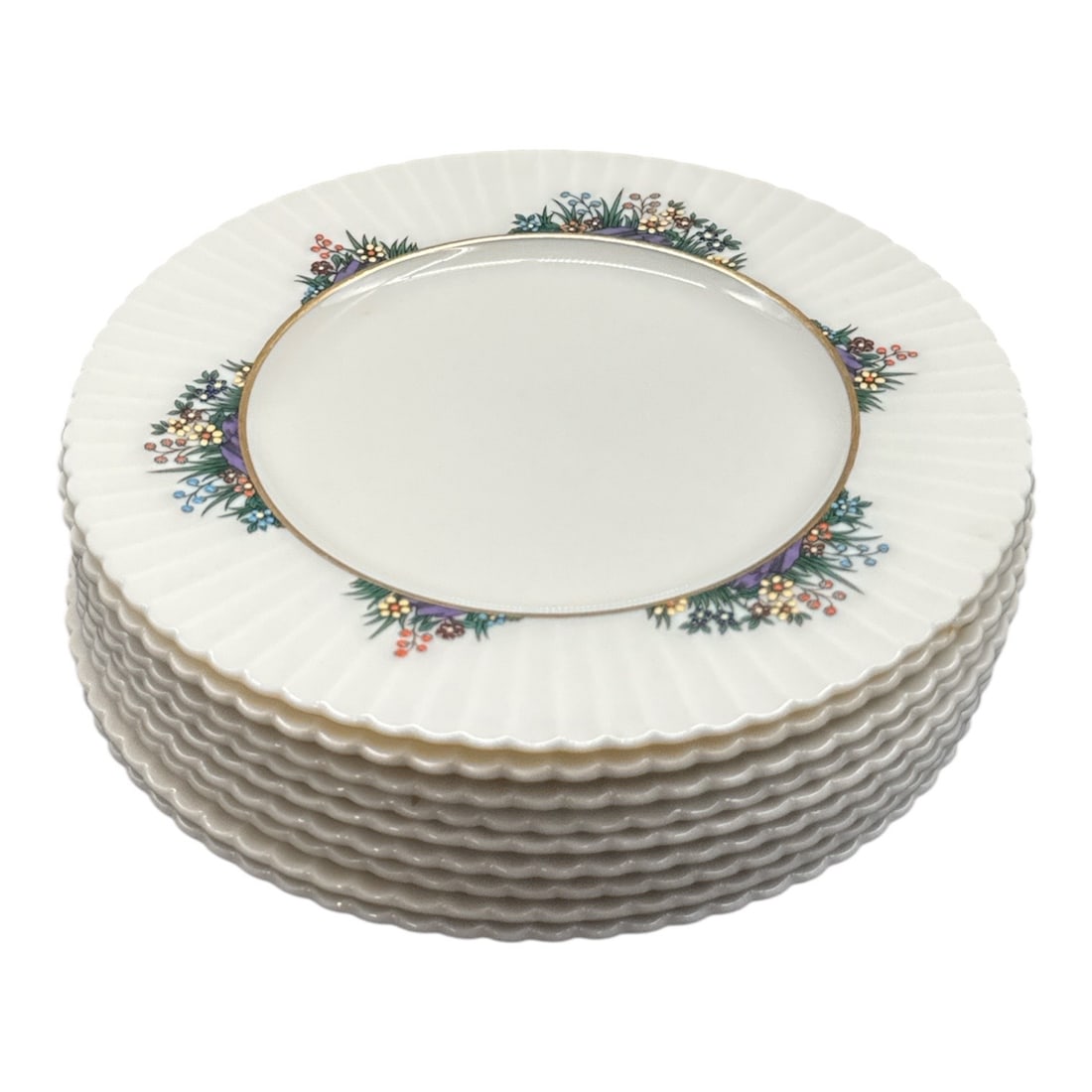 Rutledge by Lenox Porcelain Salad Plates Set of 9: Set of nine elegant porcelain plates from the Rutledge by Lenox pattern, featuring a fluted rim and delicate floral wreath border with subtle gilt trim. A classic American china design ideal for