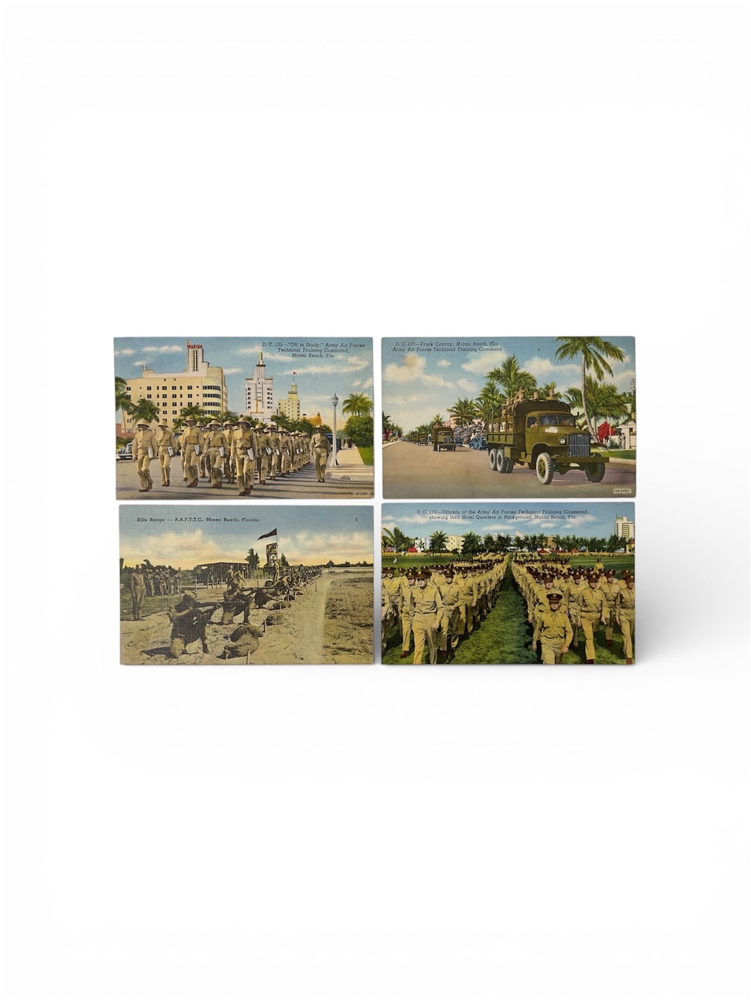 World War II Linen Postcards Miami Beach Army Air Forces 1942 Group of Four: Group of four original World War II linen postcards dated 1942, depicting scenes from the Army Air Forces Technical Training Command in Miami Beach, Florida. The images show uniformed troops marching