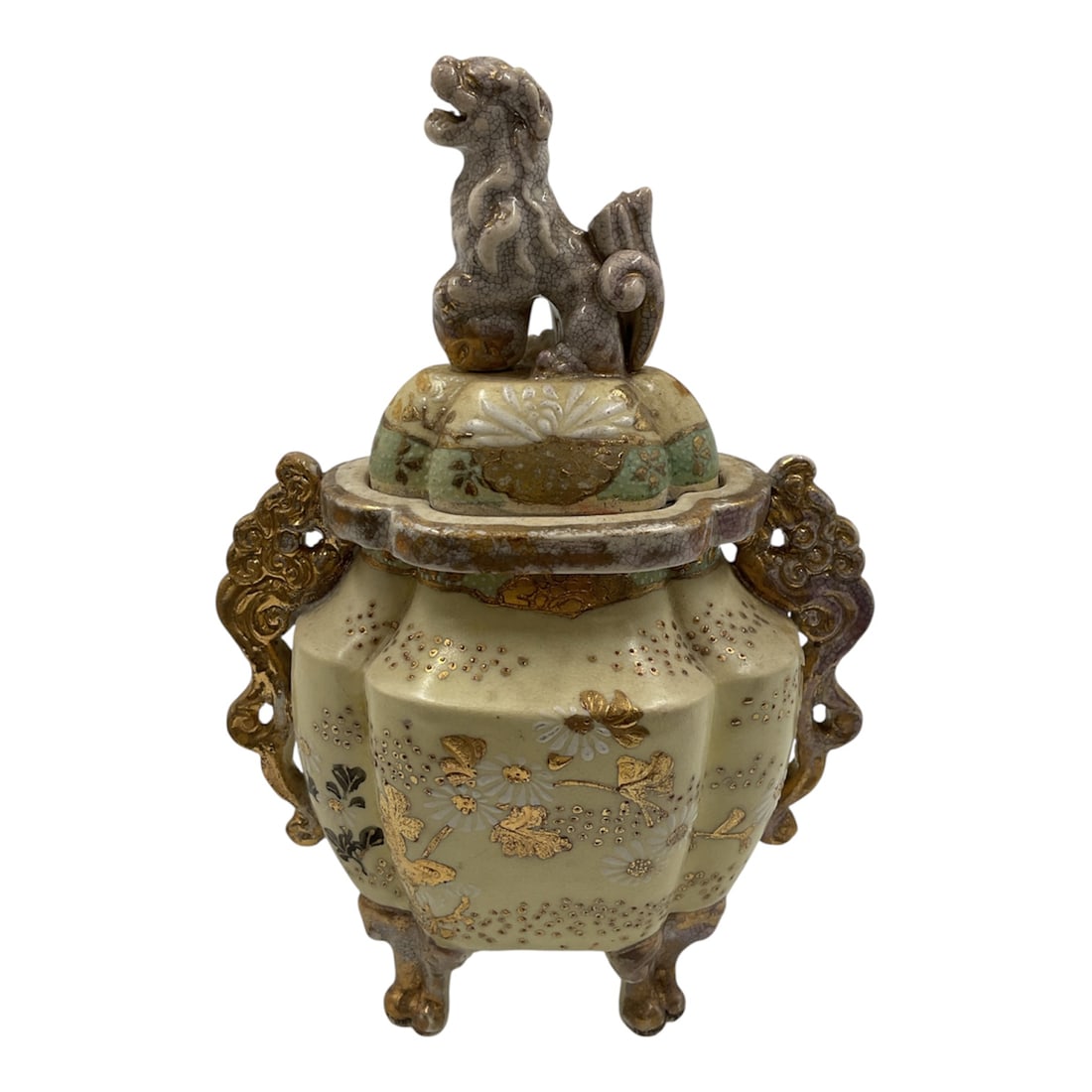 Vintage Japanese Satsuma Ware Incense Burner Koro: A vintage Japanese Satsuma ware incense burner, or koro, featuring a lidded baluster-form body with ornate applied handles and tripod feet. The lid is surmounted by a sculpted foo dog finial, adding d
