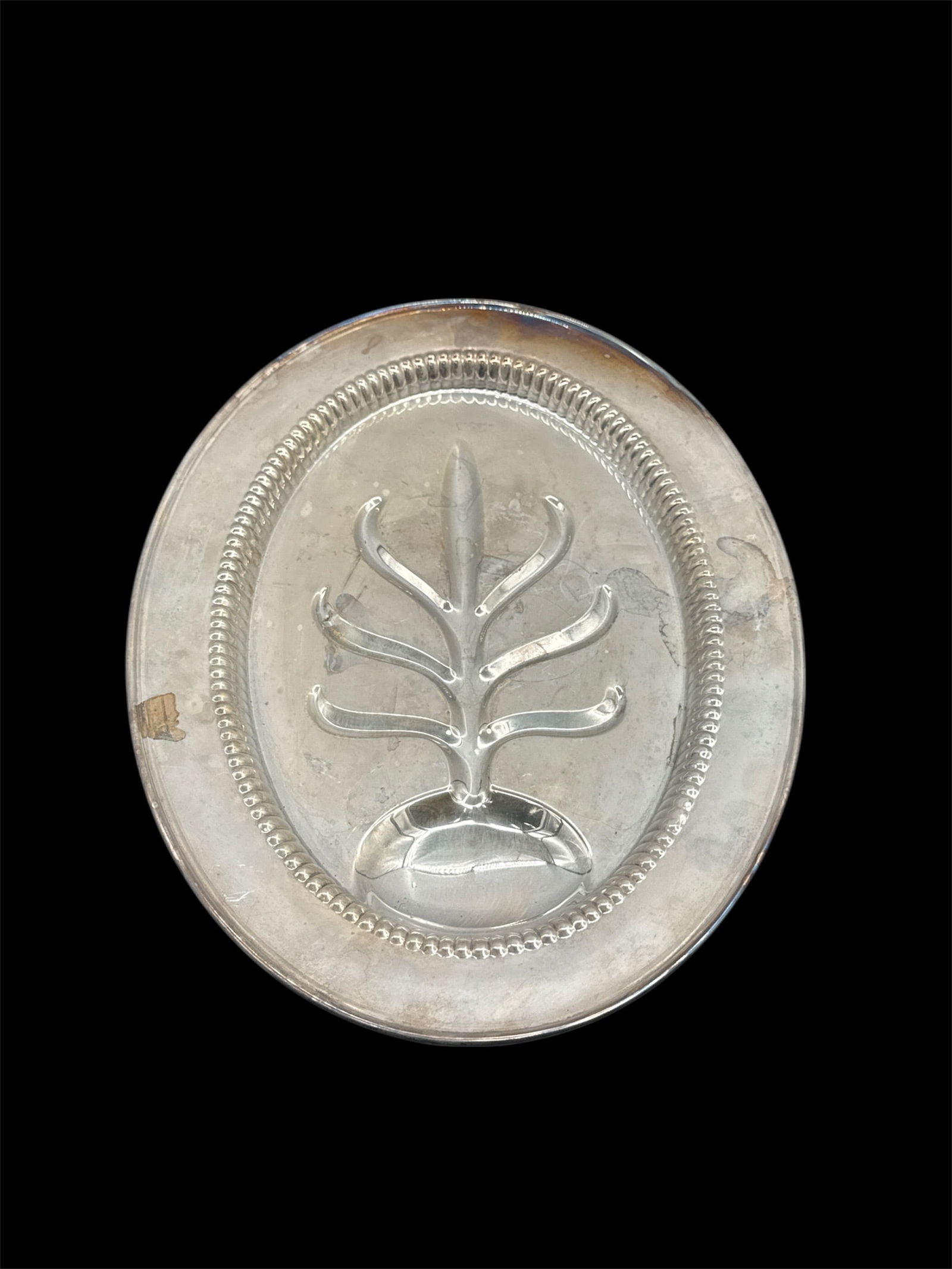 Silver Plated Meat Carving Platter: Silver plated meat carving platter with tree design. Dimensions: 16 x 12 inches.