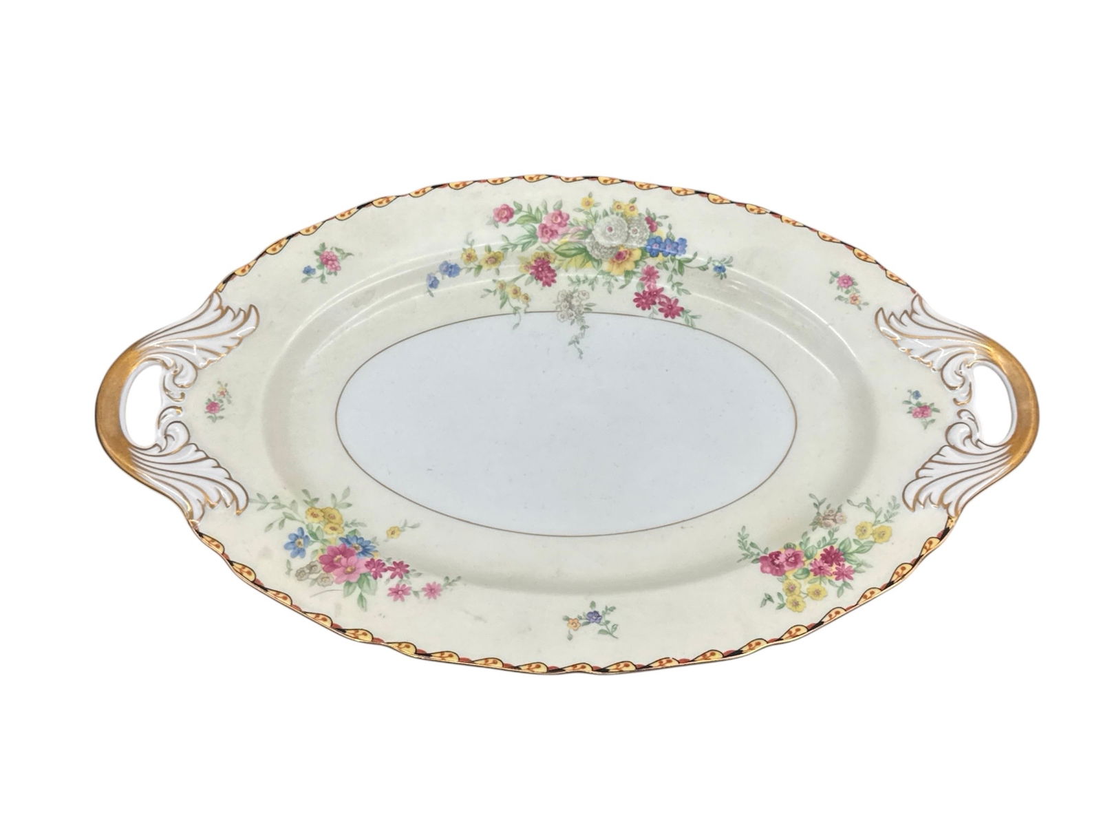 Black Knight Serving Dishes: Black Knight fine porcelain china serving dishesGravy boat with an attached underplate and a relish dish or small bowl. They were produced between approximately 1925 and 1941 by