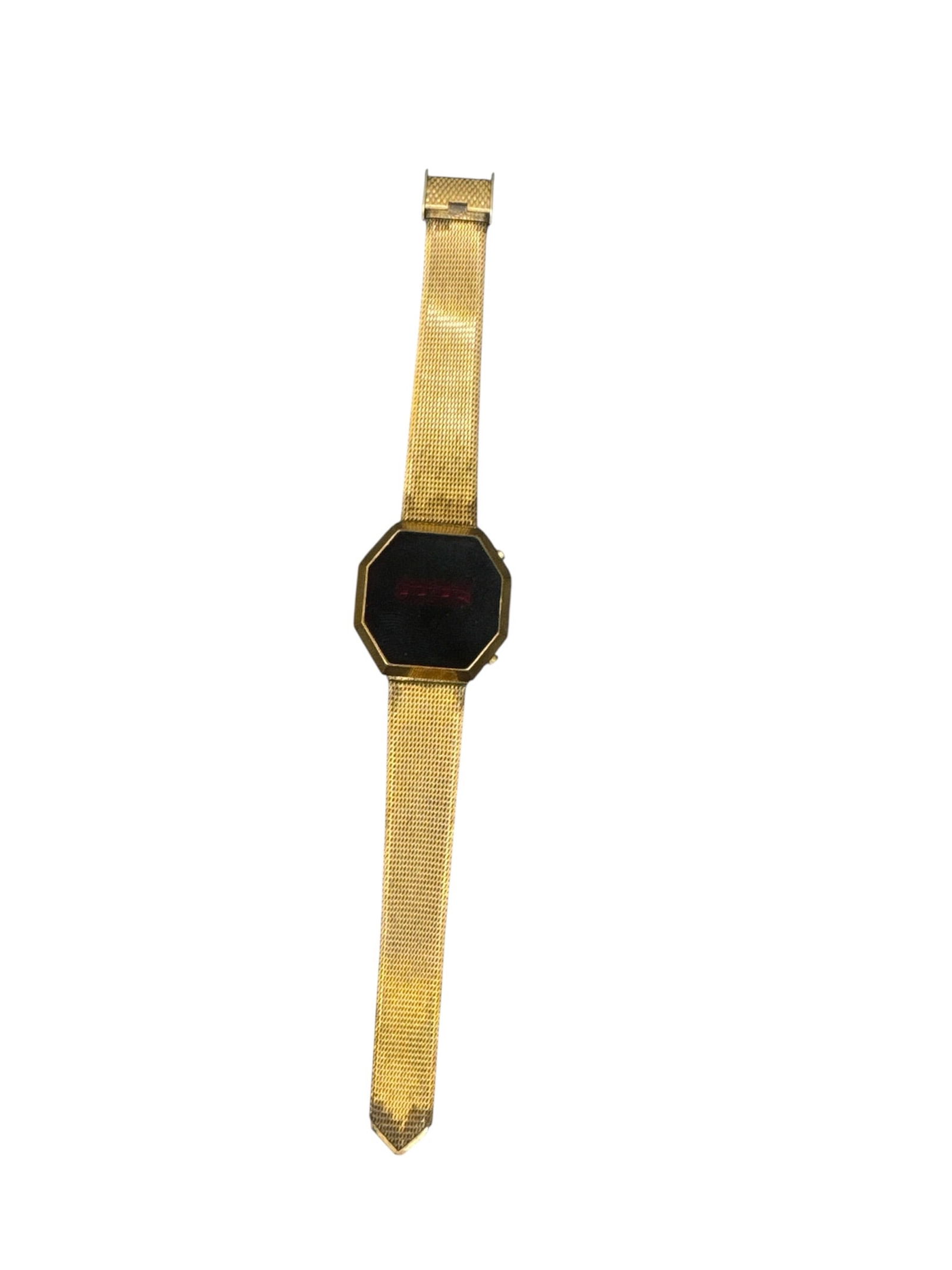 Vintage Octagonal Gold-Tone Wristwatch: Vintage Octagonal Gold-Tone WristwatchThis elegant, vintage-style timepiece features a striking octagonal case with a minimalist black dial. The design is complemented by an
